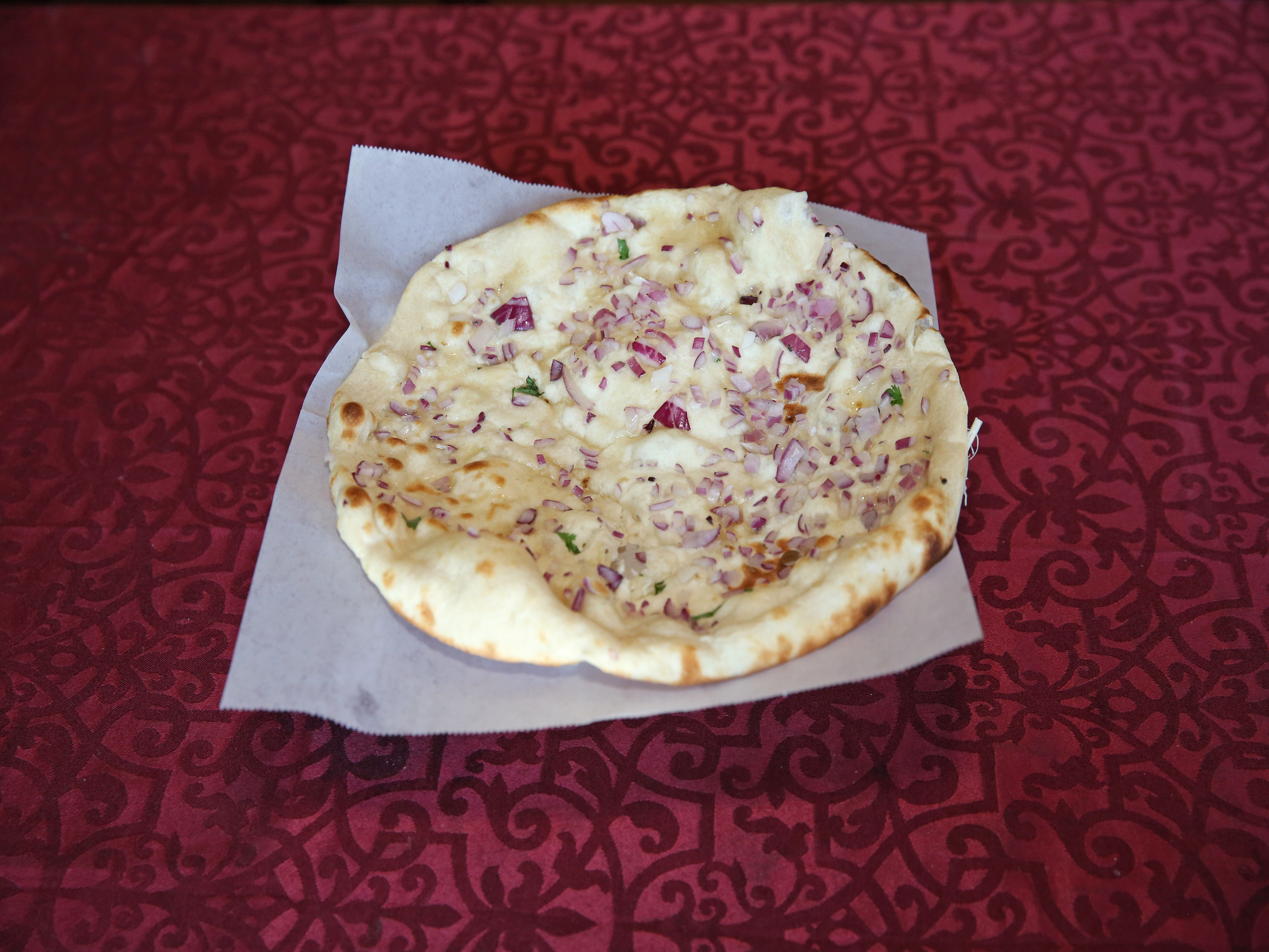 Order Butter Naan food online from Cafe India store, Cedar Park on bringmethat.com