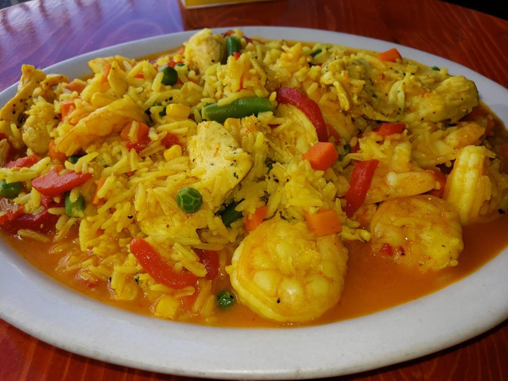 Order Leonore's Paella food online from Leonore Restaurant store, Roanoke on bringmethat.com