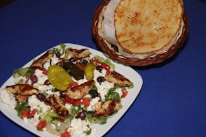 Order *Greek Chicken Salad food online from Zorbas Fine Greek Cuisine store, Albuquerque on bringmethat.com