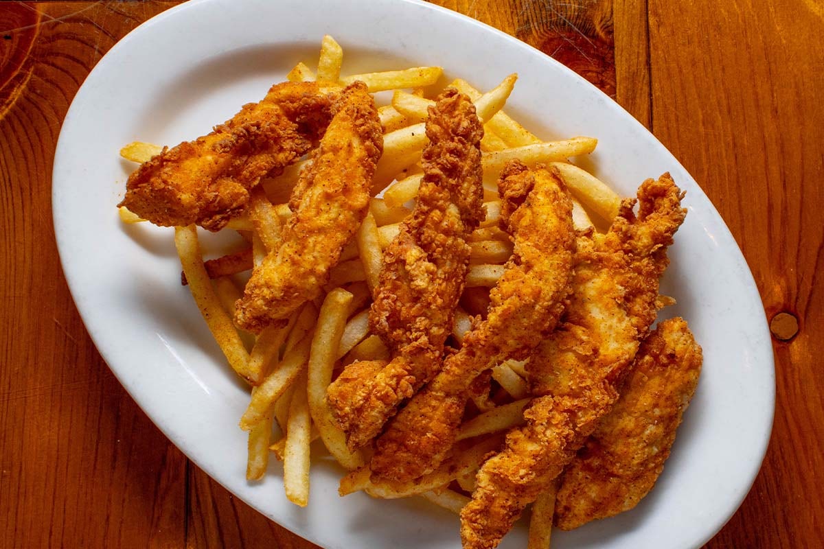 Order Chicken Tenders food online from Boudreaux's Cajun Kitchen store, Houston on bringmethat.com