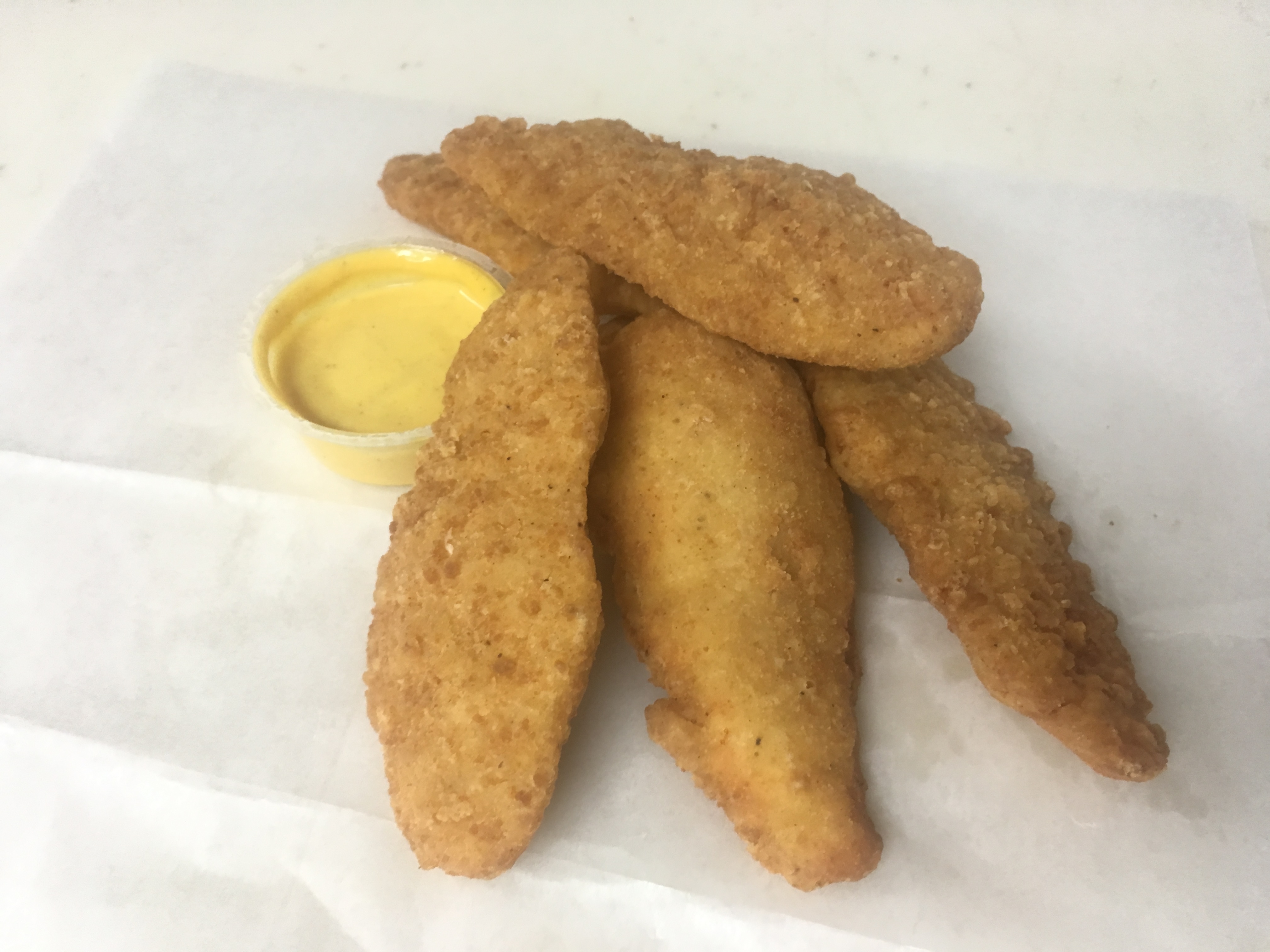 Order 4pc Chicken Tenders food online from Katsouprinis Pizza Squared store, Bethesda on bringmethat.com