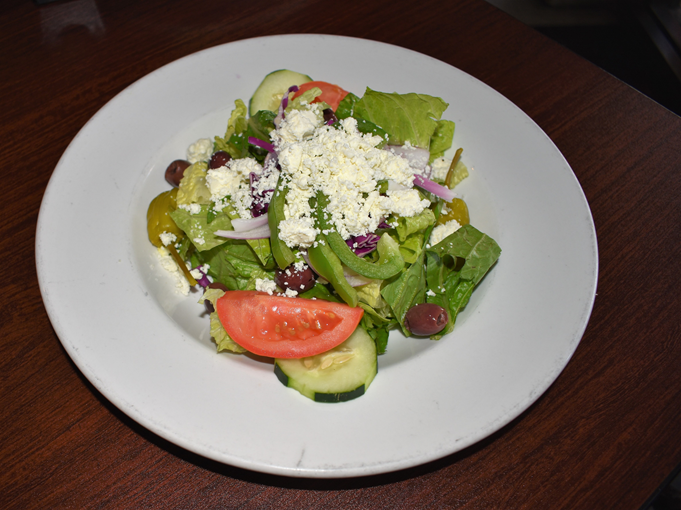 Order Greek Salad food online from Russo's New York Pizzeria store, Houston on bringmethat.com