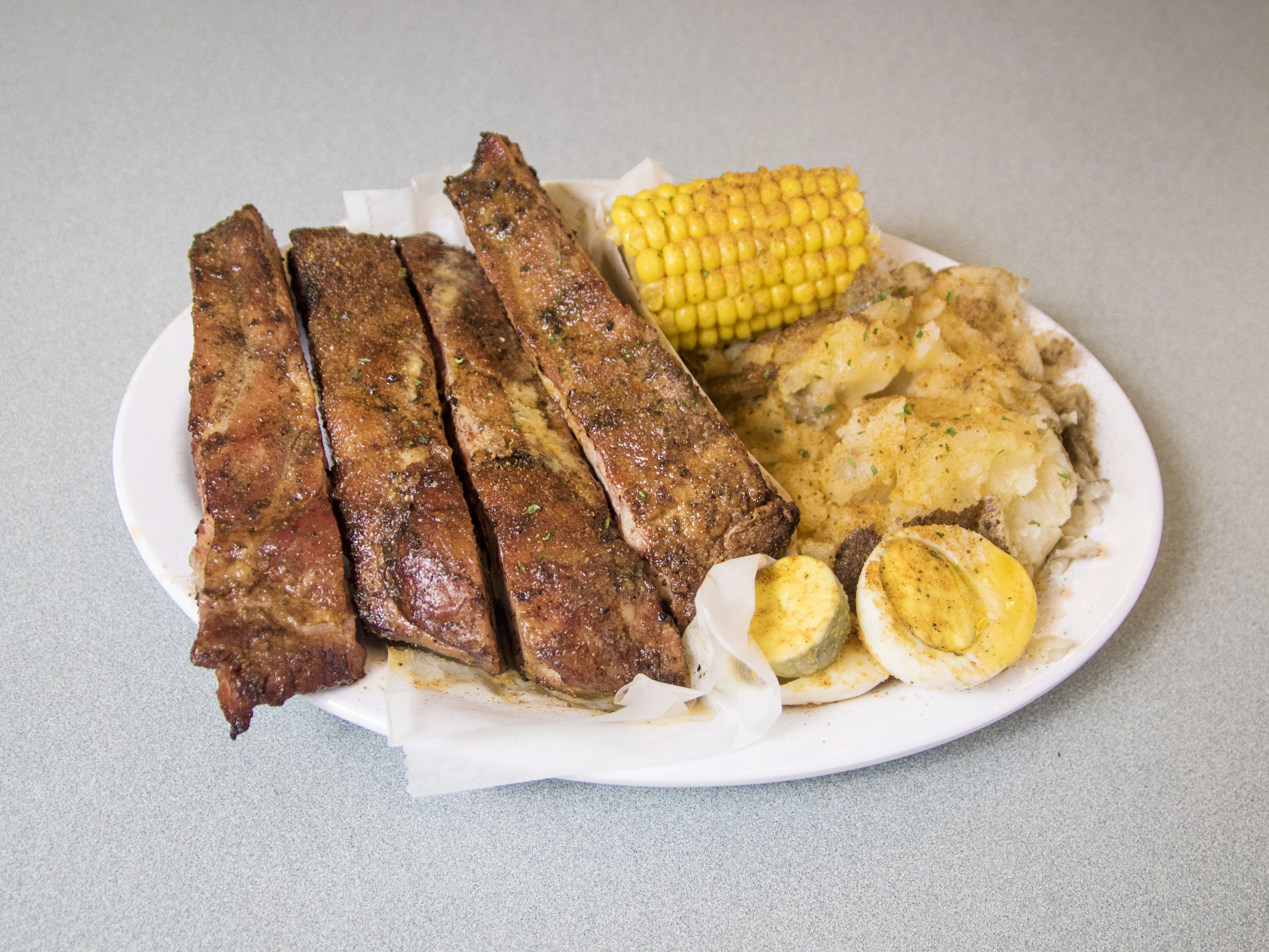 Order Garlic Rib Dinner food online from The Crab House store, Detroit on bringmethat.com