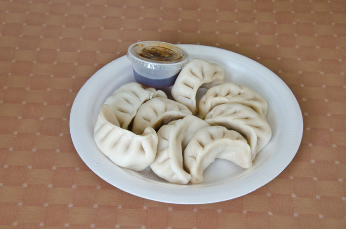 Order 9. Steamed Dumplings food online from New No. 1 Chinese Restaurant store, Brooklyn on bringmethat.com
