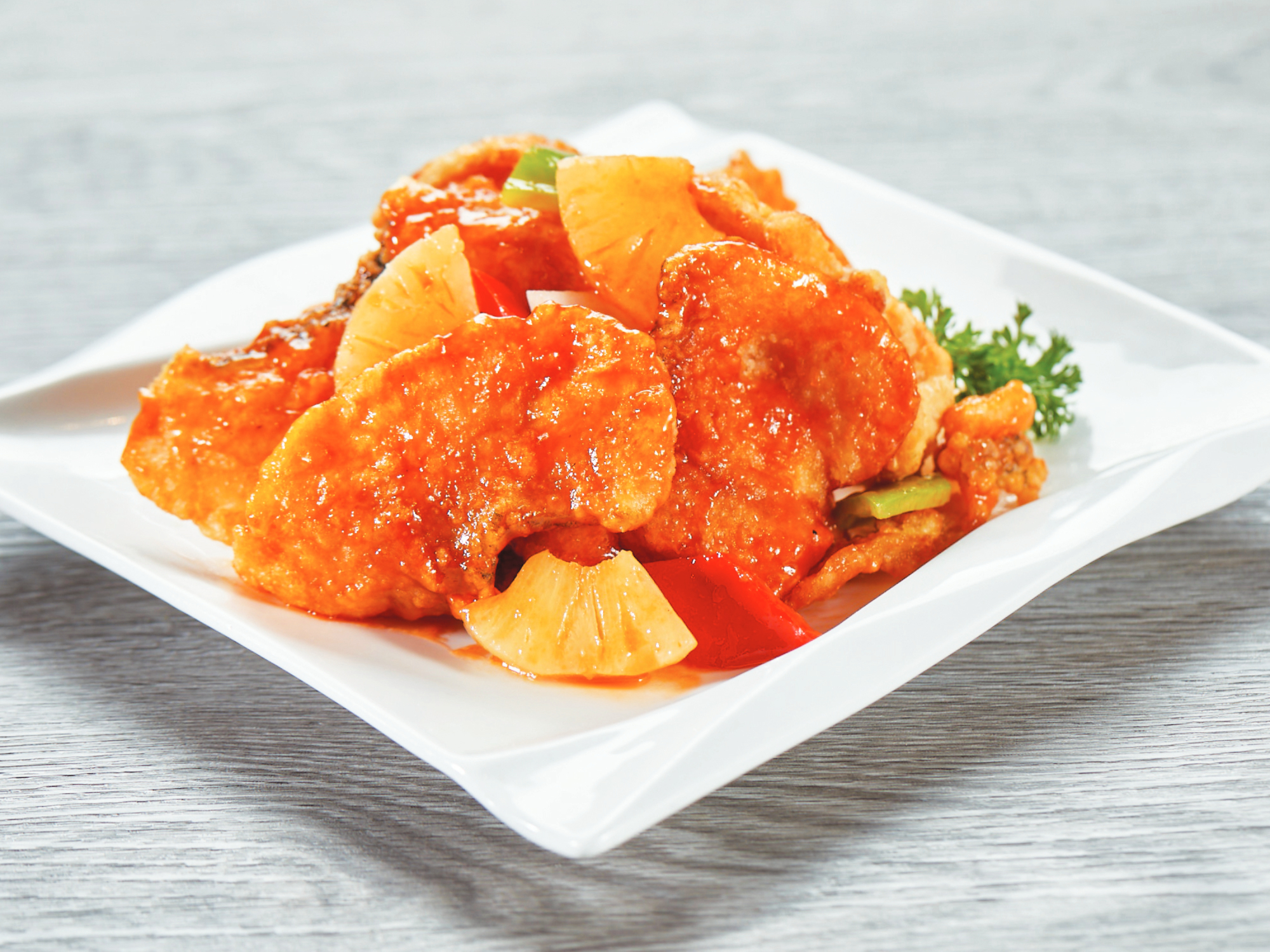 Order E8. Crispy Sweet and Sour Cod Fish food online from Paradise Dynasty store, Costa Mesa on bringmethat.com