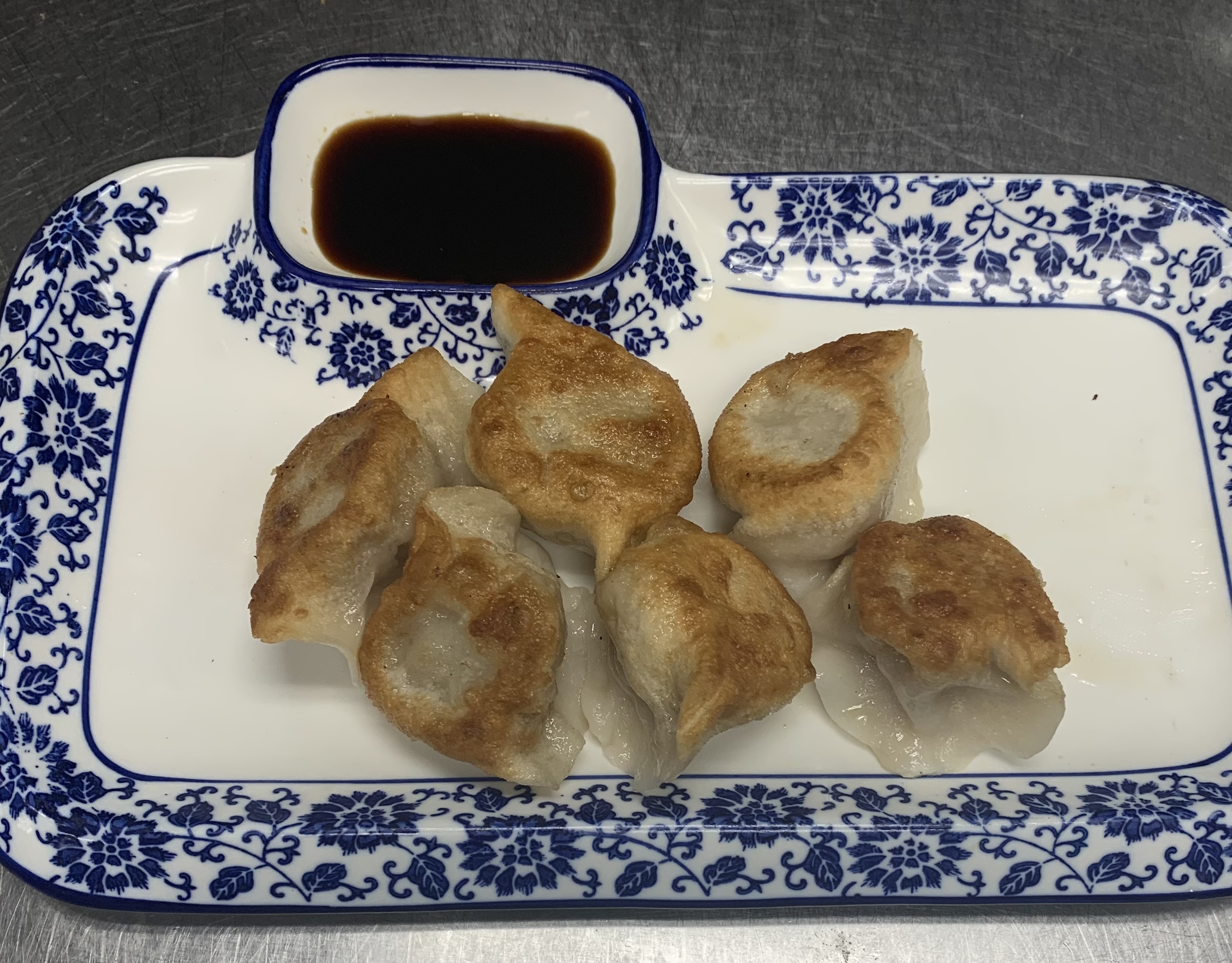 Order 20. Dumpling Pan Fried(6pieces)锅贴 food online from ShangWei Szechuan store, Bethlehem on bringmethat.com