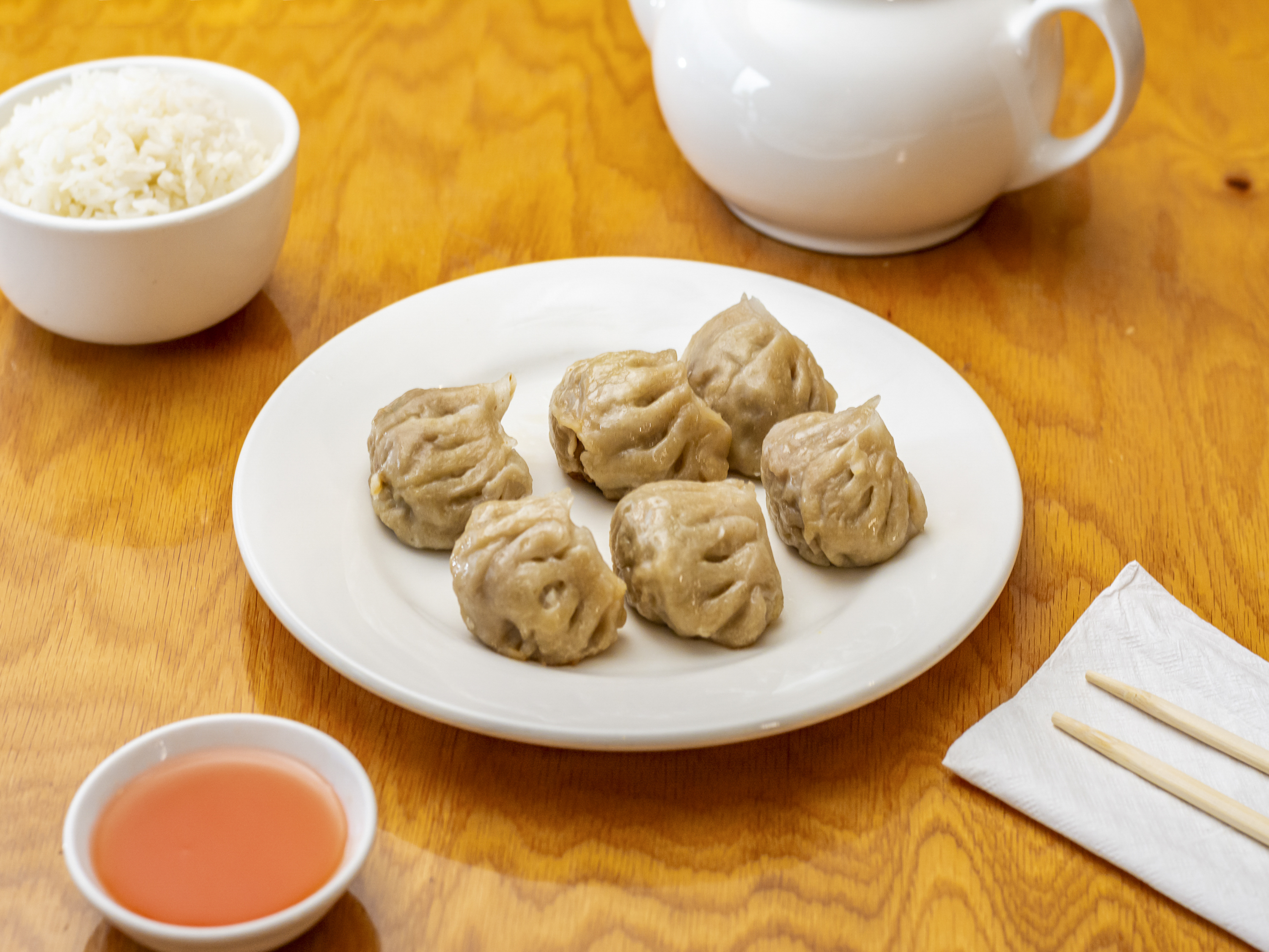 Order 6 Piece Pork Dumplings food online from Ministop Chinese Restaurant store, Kennesaw on bringmethat.com