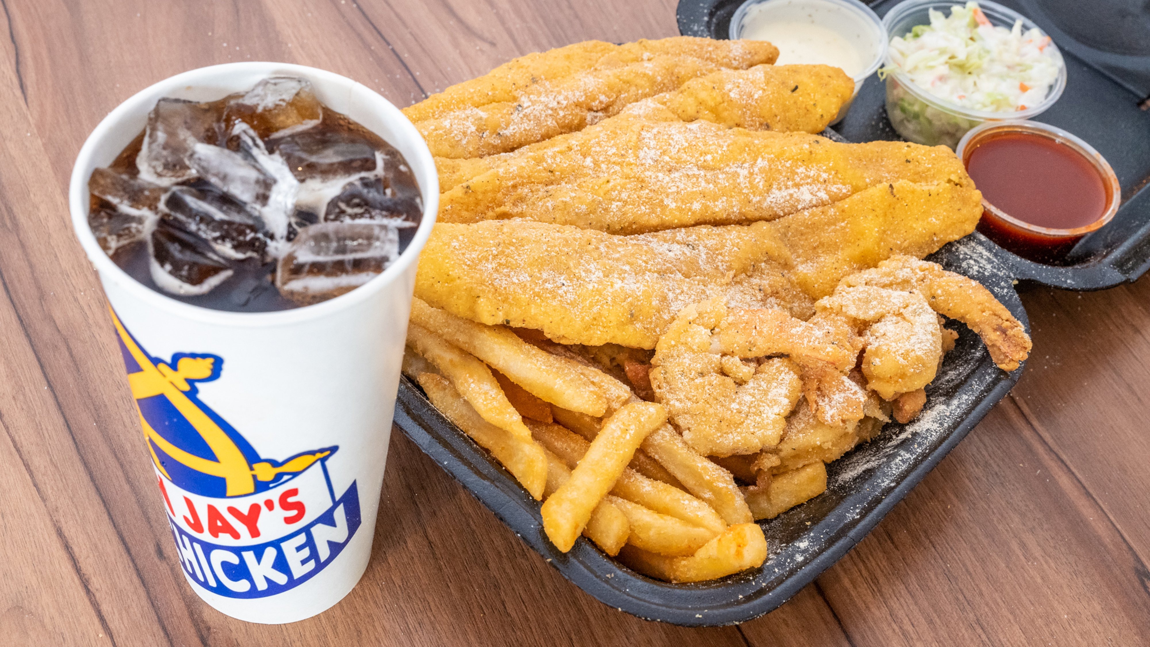 Order Large Shrimp (6 Pieces) and Catfish (2 Pieces) Combo food online from Captain Jay's Fish & Chicken store, Southfield on bringmethat.com