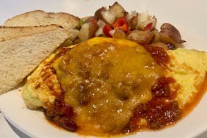 Order Texas Chili & Cheddar Omelette food online from Cafe 50's (west la) store, Los Angeles on bringmethat.com