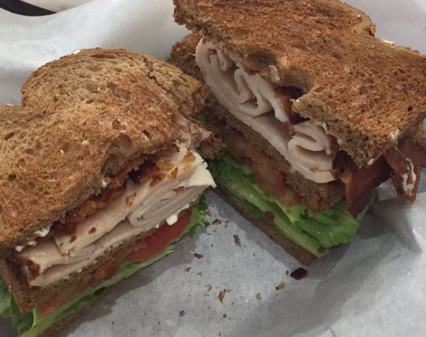 Order 43. Turkey Club with Avocado Sandwich food online from Ginger And Spice Noodle & Grill store, Pasadena on bringmethat.com