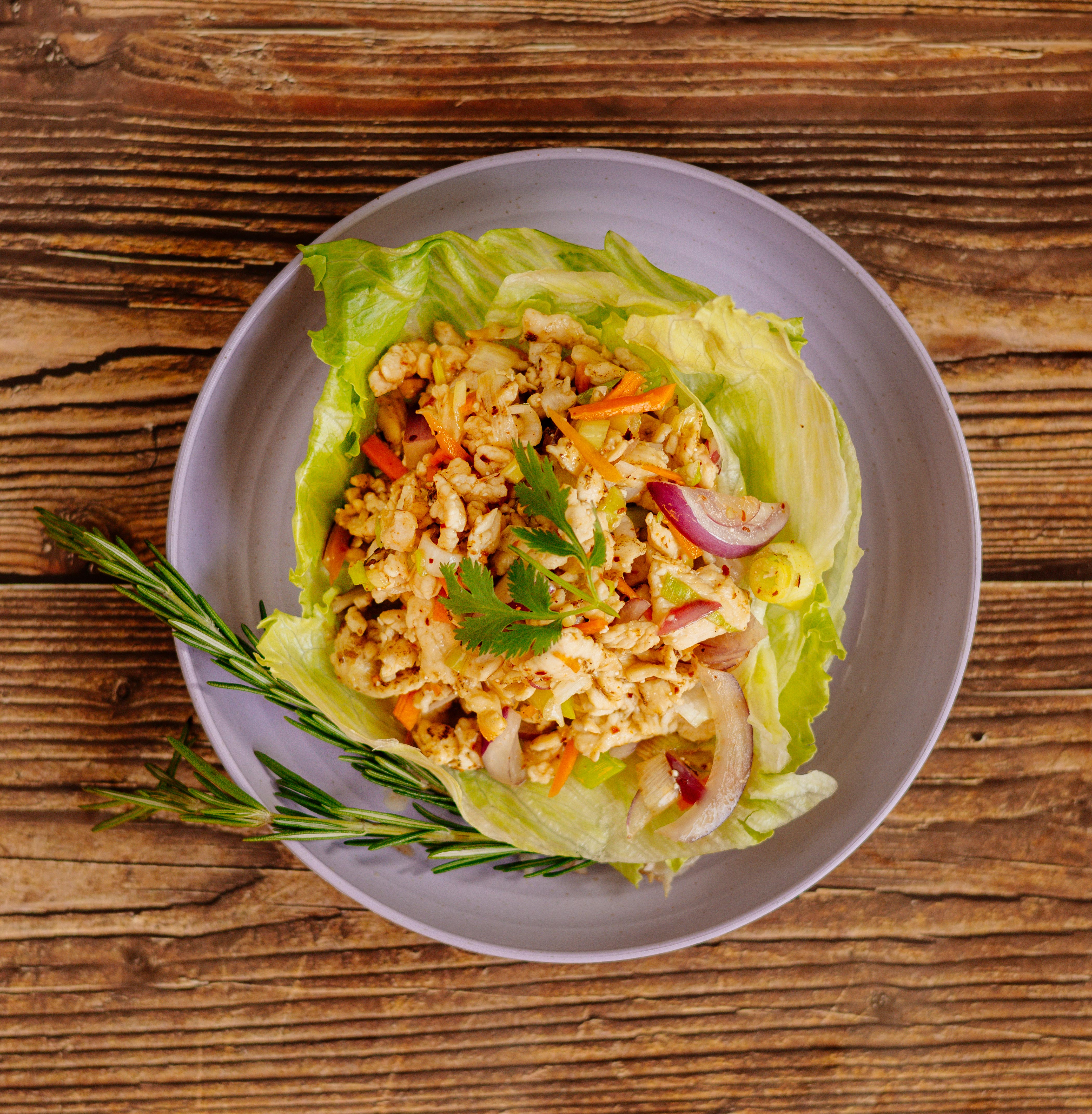Order Spicy Labb Chicken Salad food online from Herbs Thai Bistro store, New York on bringmethat.com