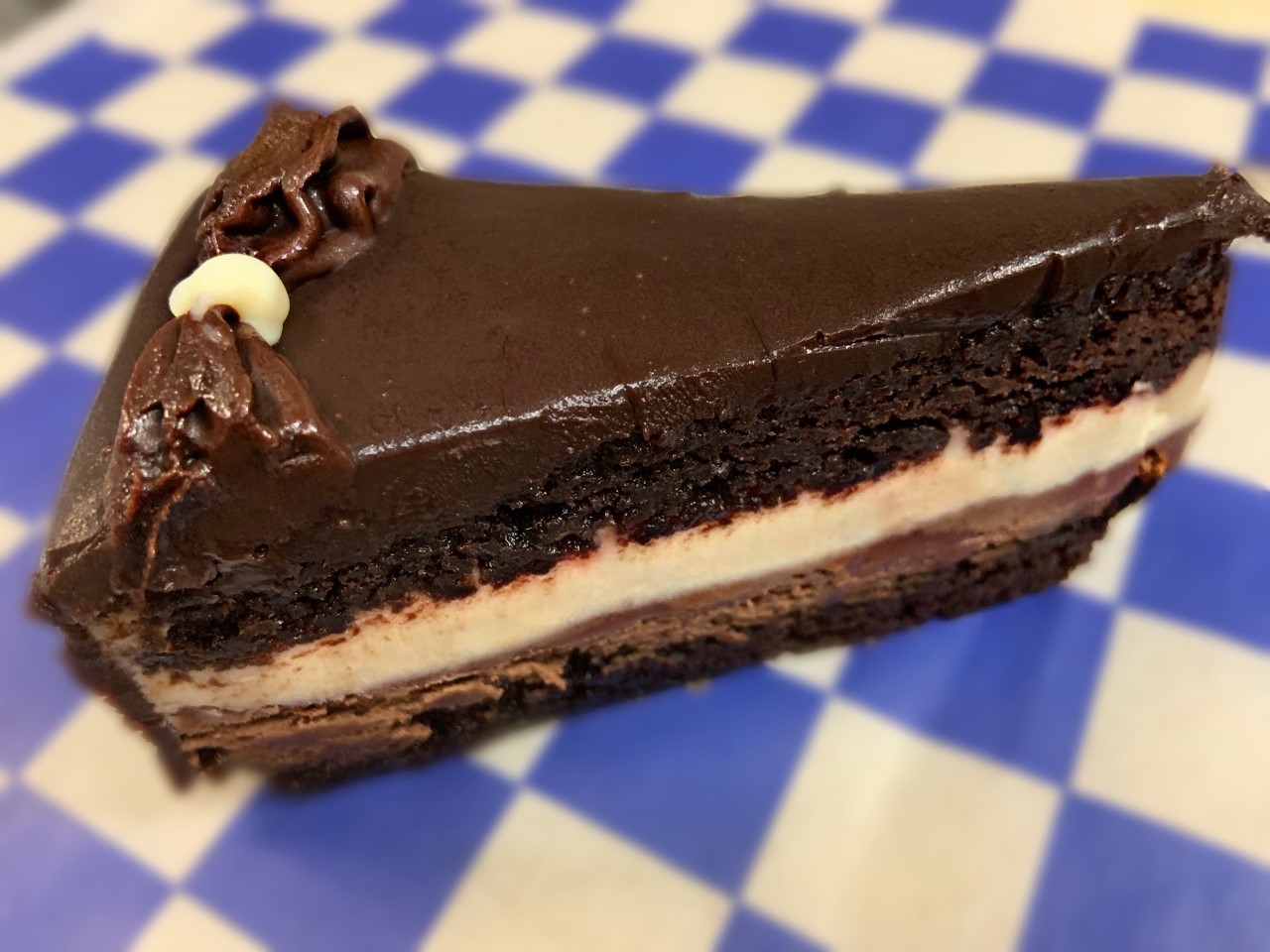 Order White and Dark Chocolate Mousse Cake food online from Village Pizza & Seafood store, Santa Fe on bringmethat.com
