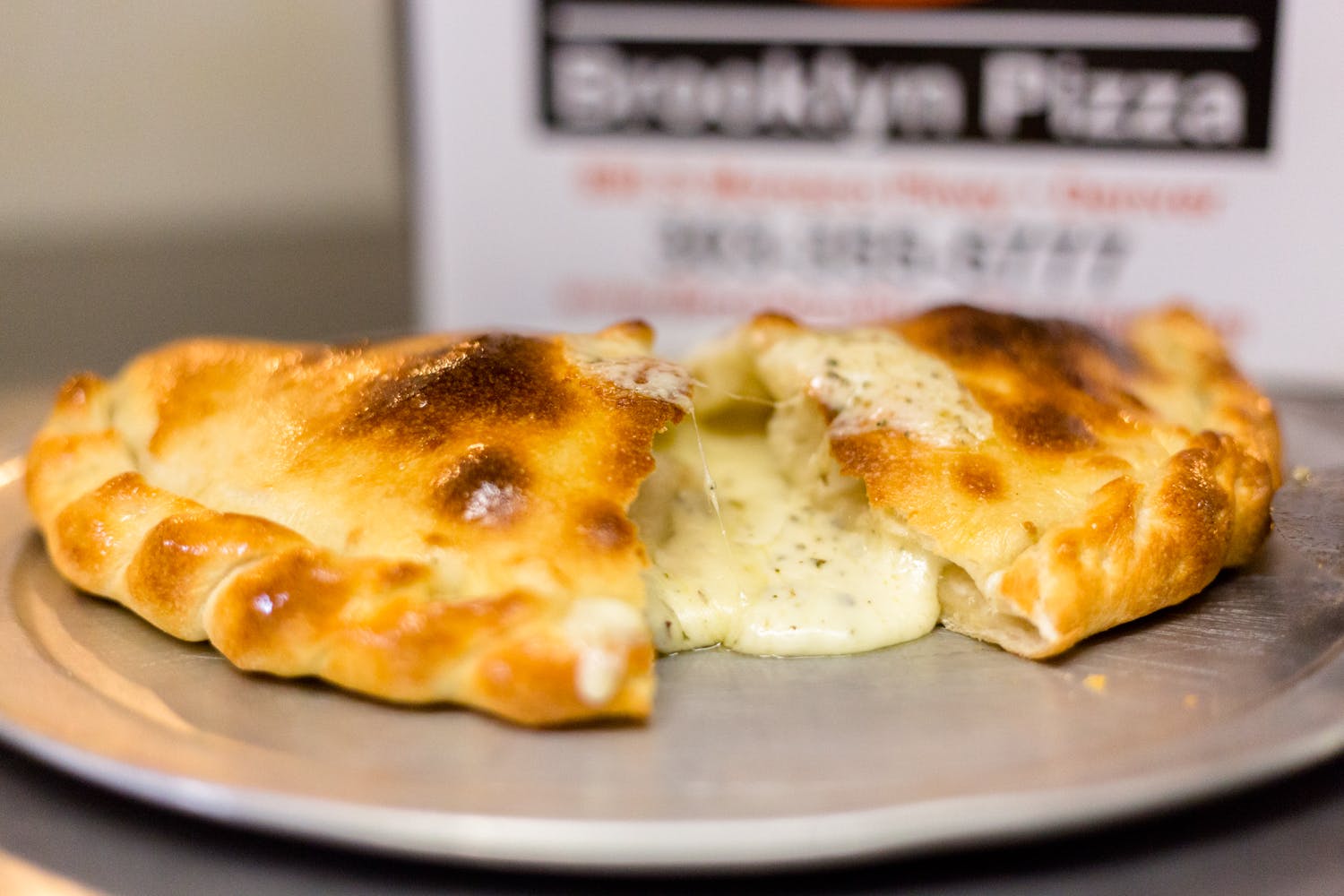 Order The Mozzarella Only Calzone - Calzone food online from Brooklyn Pizza Denver store, Denver on bringmethat.com