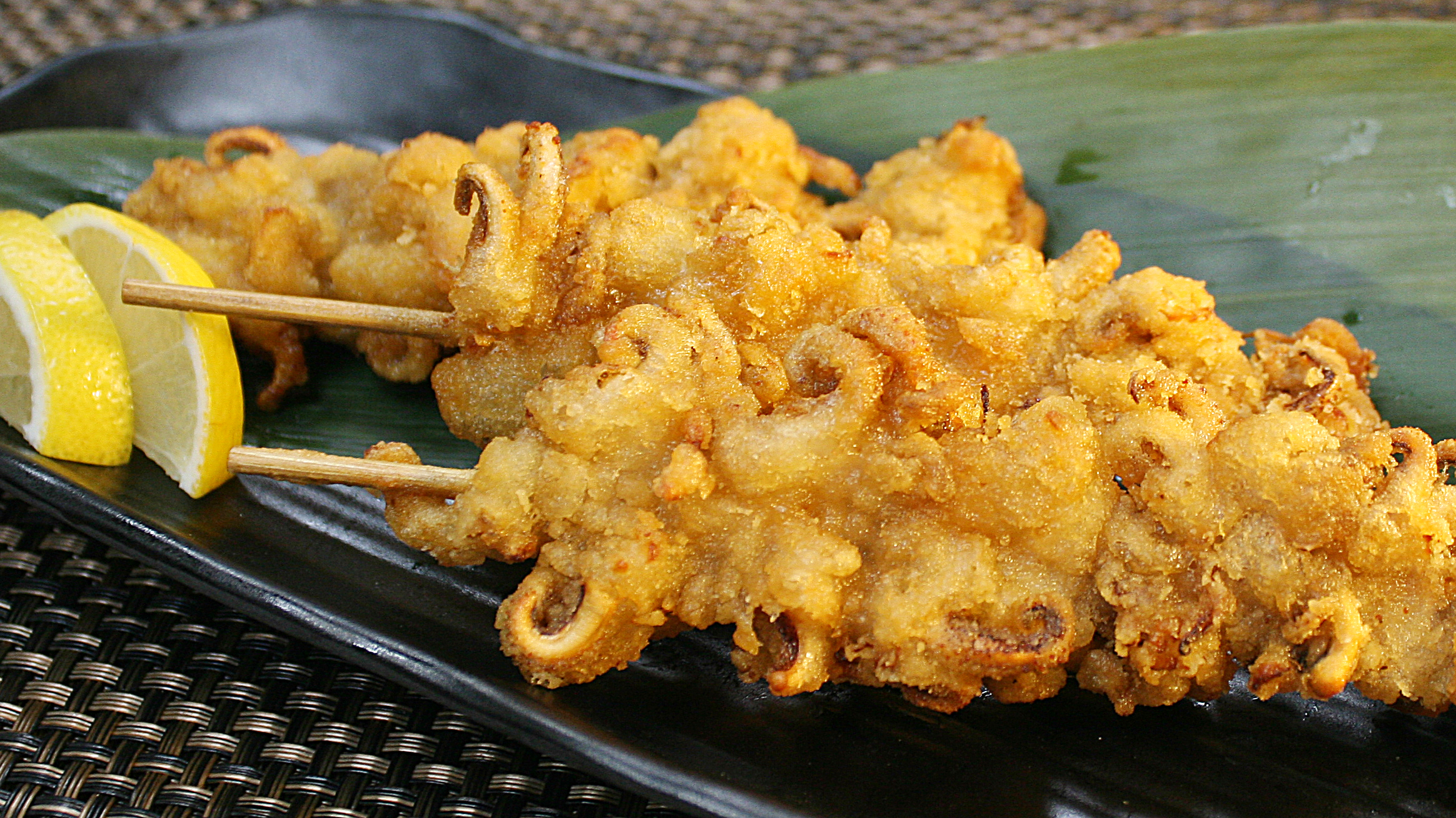 Order Fried Squid Tentacles food online from Oki Doki Roll & Sushi store, Brea on bringmethat.com
