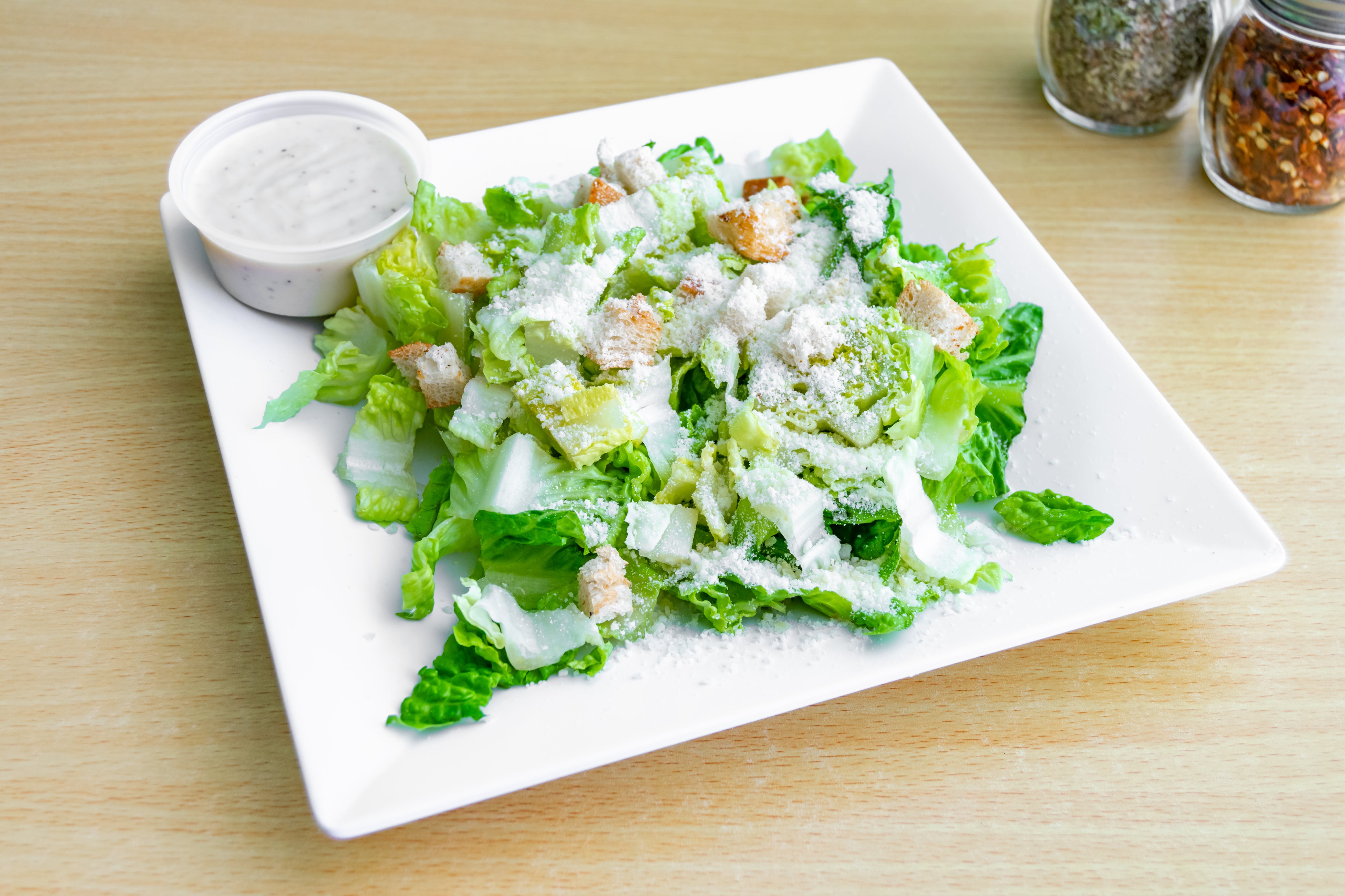 Order Caesar Salad - Salad food online from Dolce Pizza store, East Orange on bringmethat.com