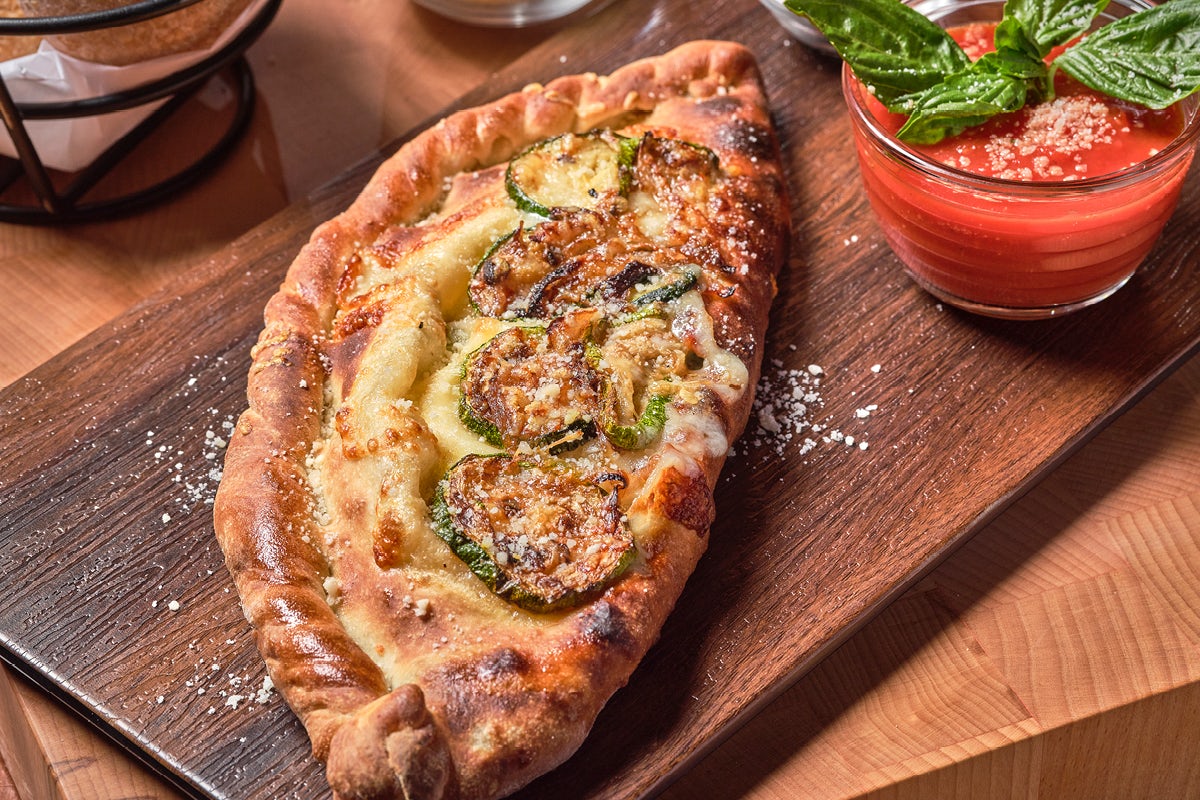 Order Roasted Vegetable Calzone food online from Bertucci store, Chelmsford on bringmethat.com