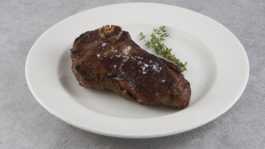 Order Dry Aged Kansas City Strip* 18 Ounce food online from The Palm store, Atlanta on bringmethat.com