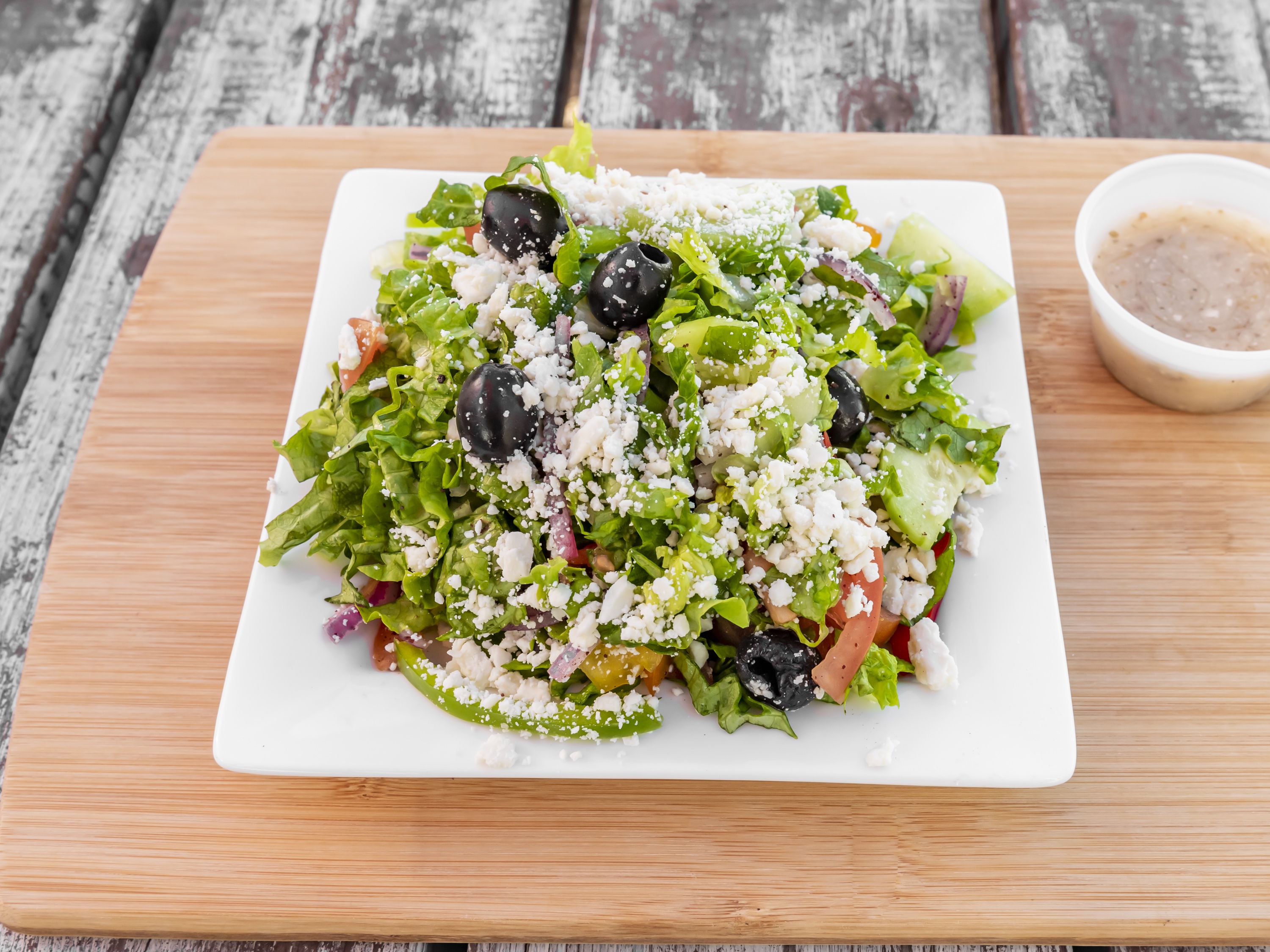 Order 1. Greek Salad food online from Jad Mediterranean Grill store, Austin on bringmethat.com