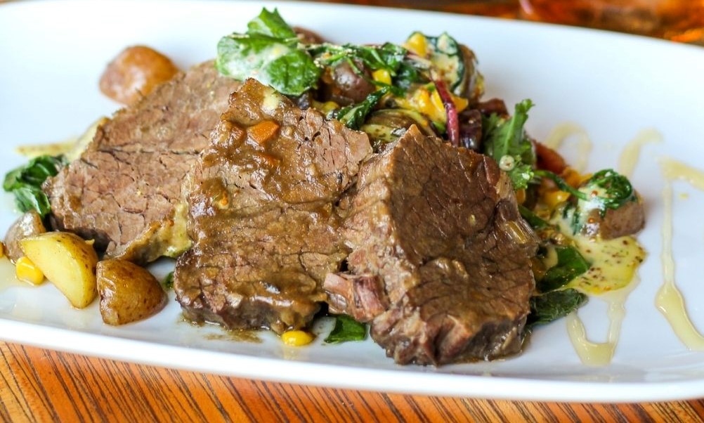 Order Braised Beef Brisket and Potato Hash food online from Gravity Taphouse Grille store, Grand Rapids on bringmethat.com
