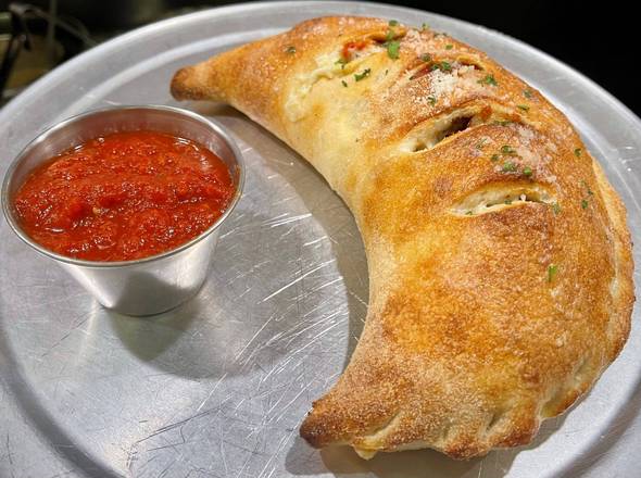 Order CALZONE Veggie food online from Anthony's Eatalian store, Dallas on bringmethat.com