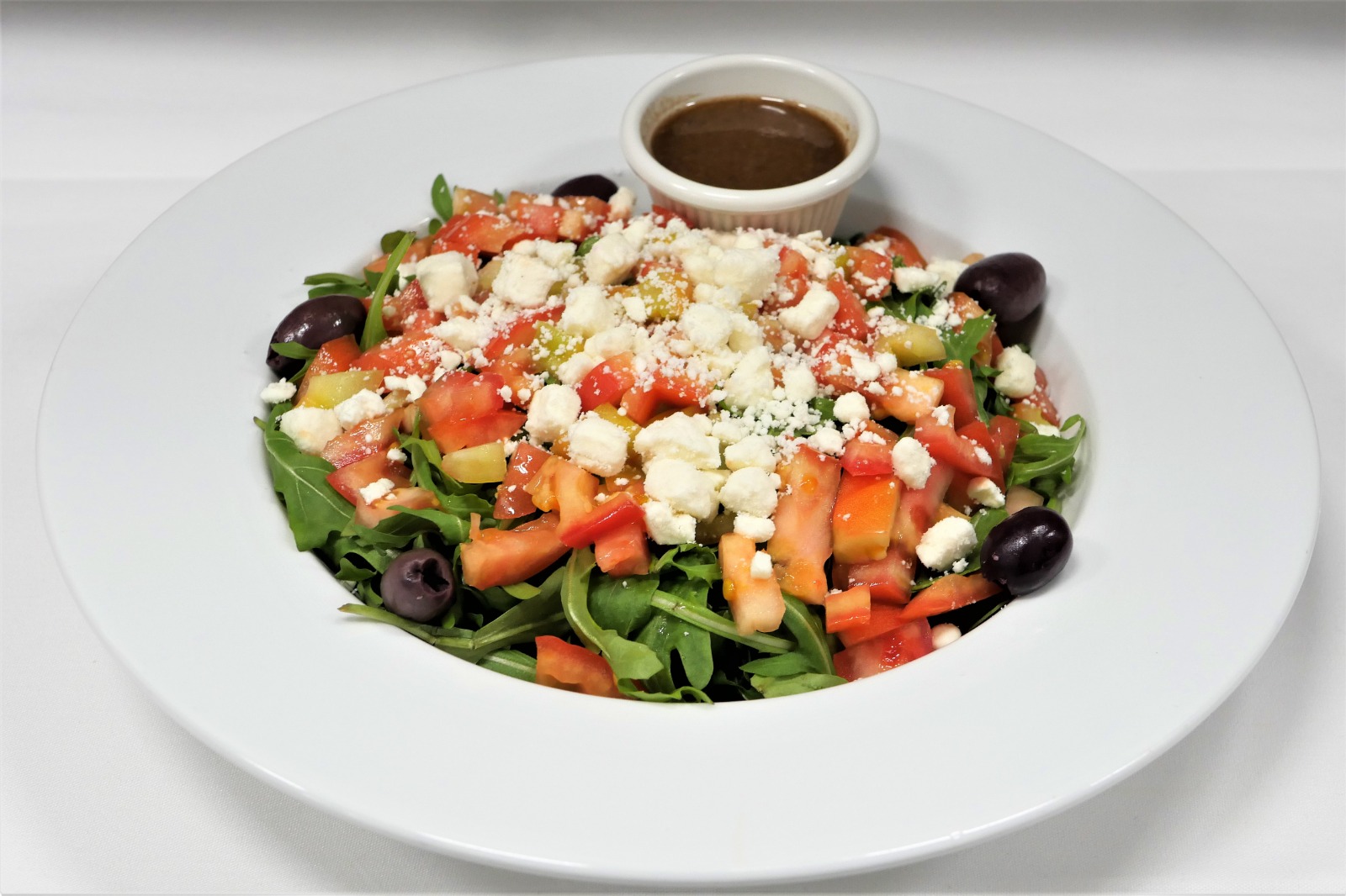 Order Arugula Salad food online from Maya Bistro store, Arlington on bringmethat.com