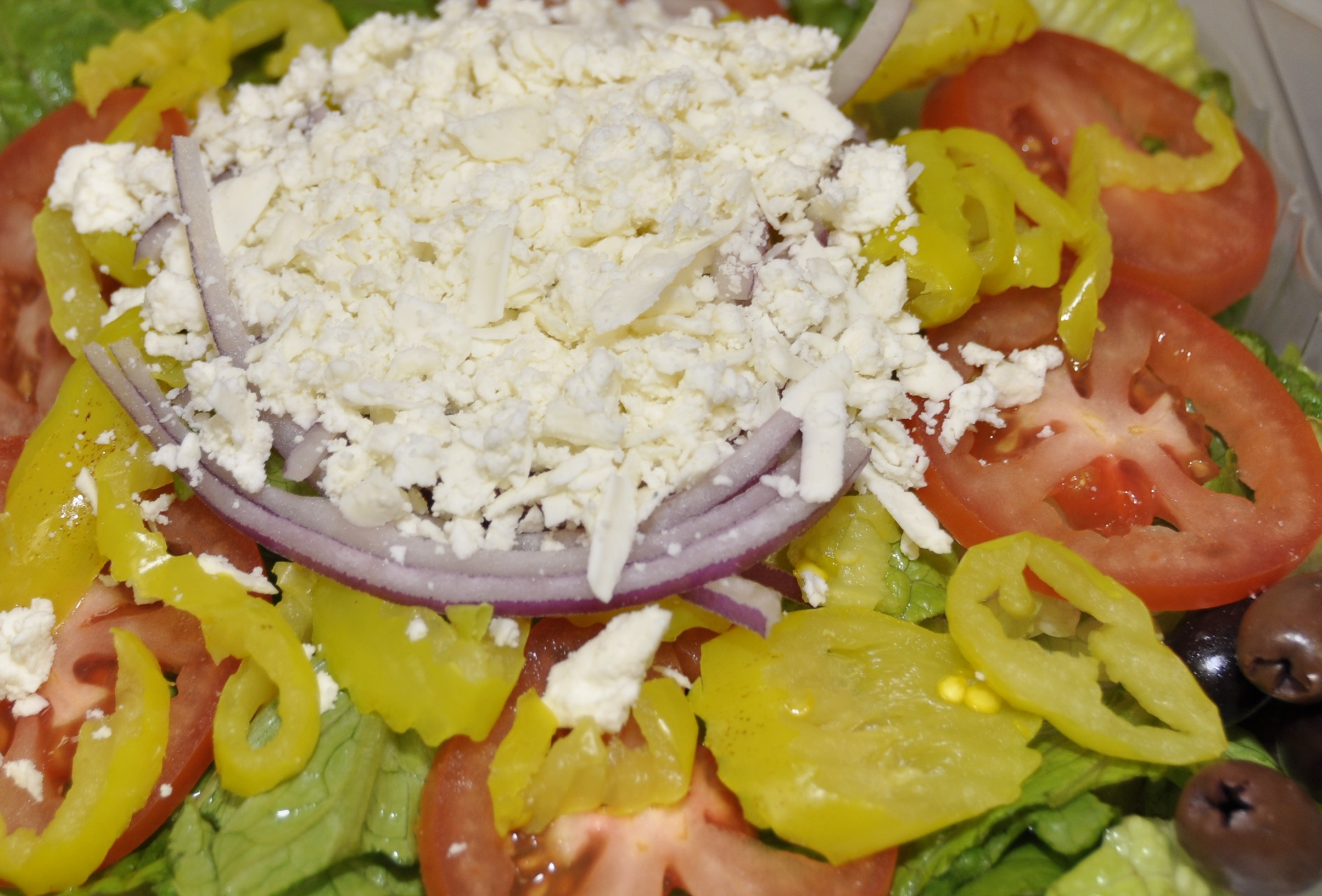 Order Greek Salad food online from Mega Pizza store, Raleigh on bringmethat.com