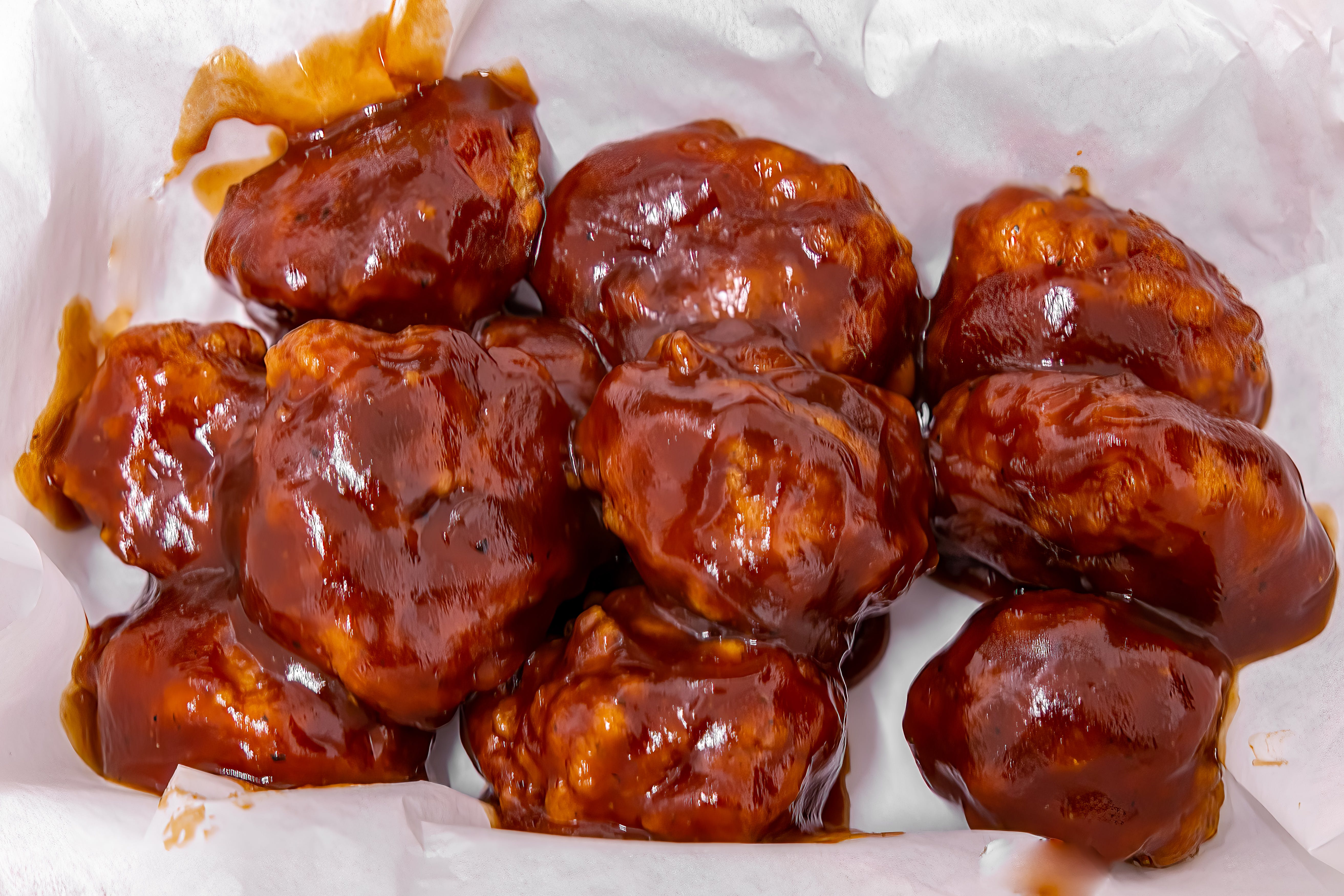 Order Boneless Chicken Wings - 6 Pieces food online from Fabiano's Grocery & Deli store, Grand Ledge on bringmethat.com
