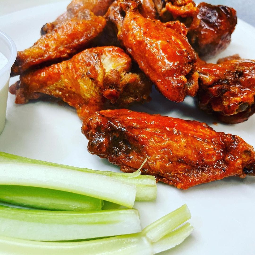 Order Chicken Wings - Dozen food online from Sinapi Pizzeria store, Brewster on bringmethat.com