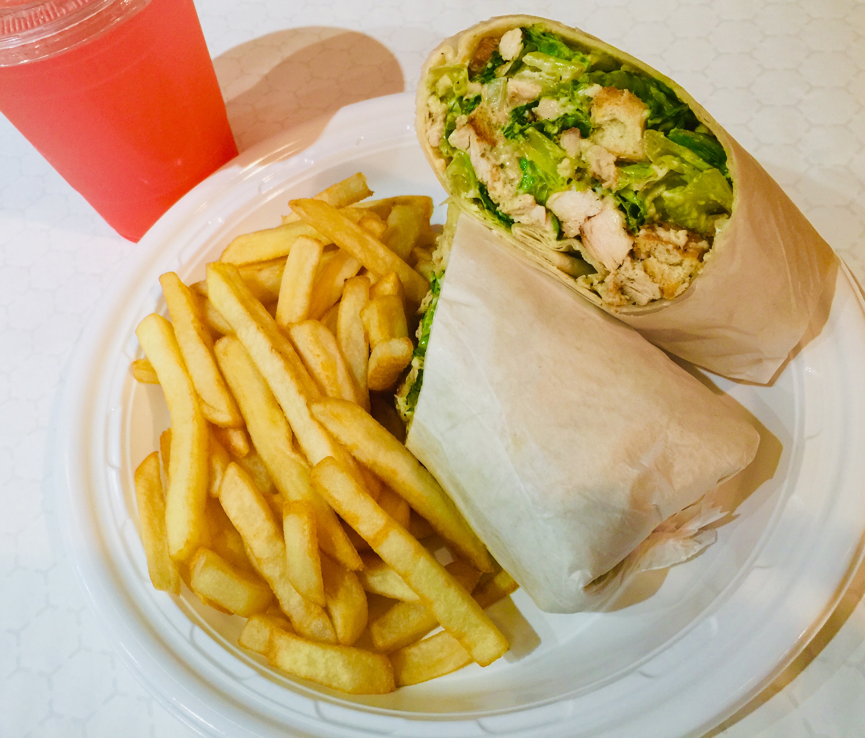 Order Grilled Chicken Caesar Wrap Deluxe food online from Tio Pio - Willoughby St. store, Brooklyn on bringmethat.com