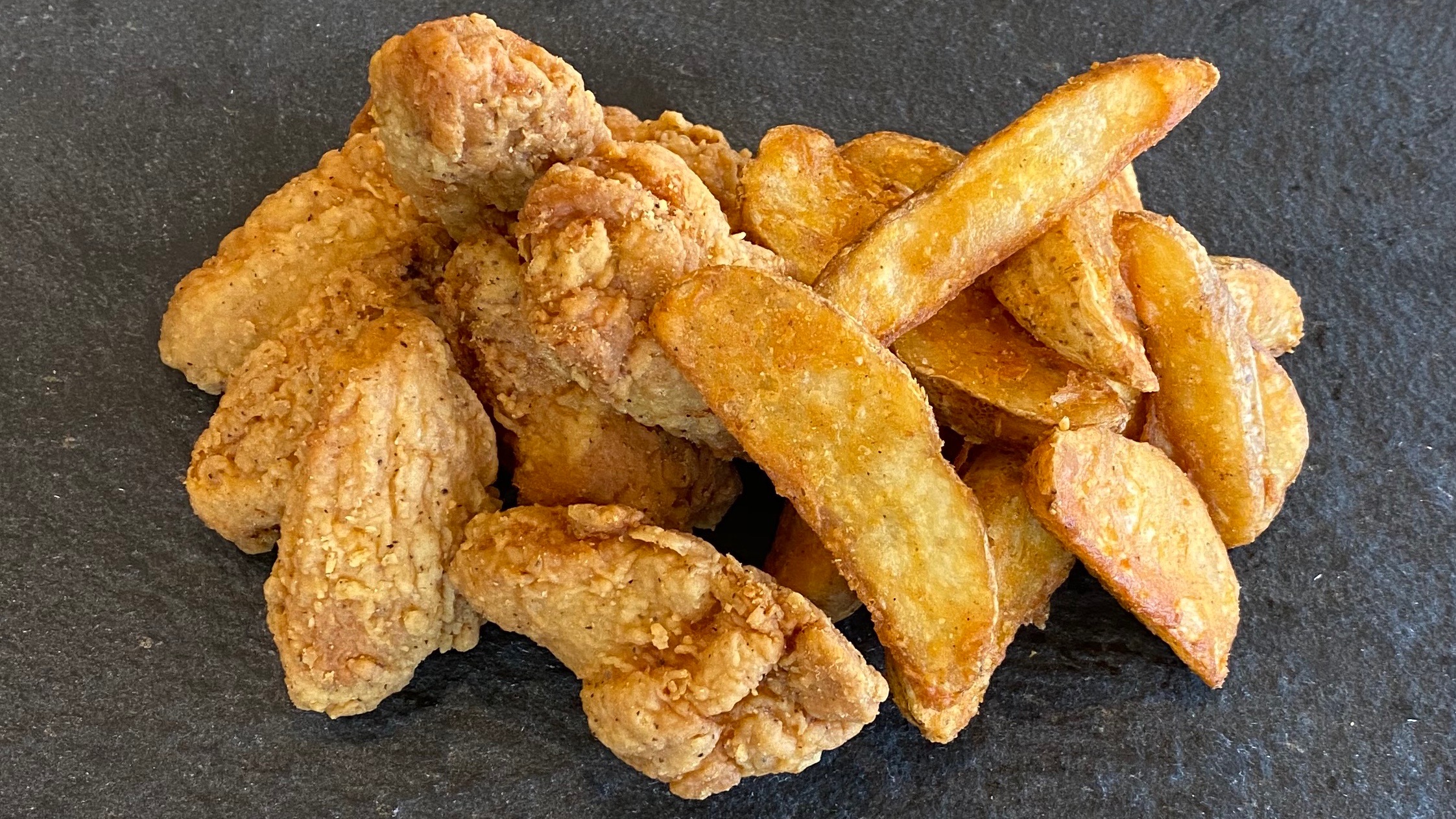 Order 6 Wings and Potato Wedges food online from Sizzler store, Downey on bringmethat.com