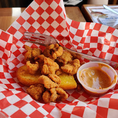 Order Gator Bites food online from The Lost Cajun store, Humble on bringmethat.com