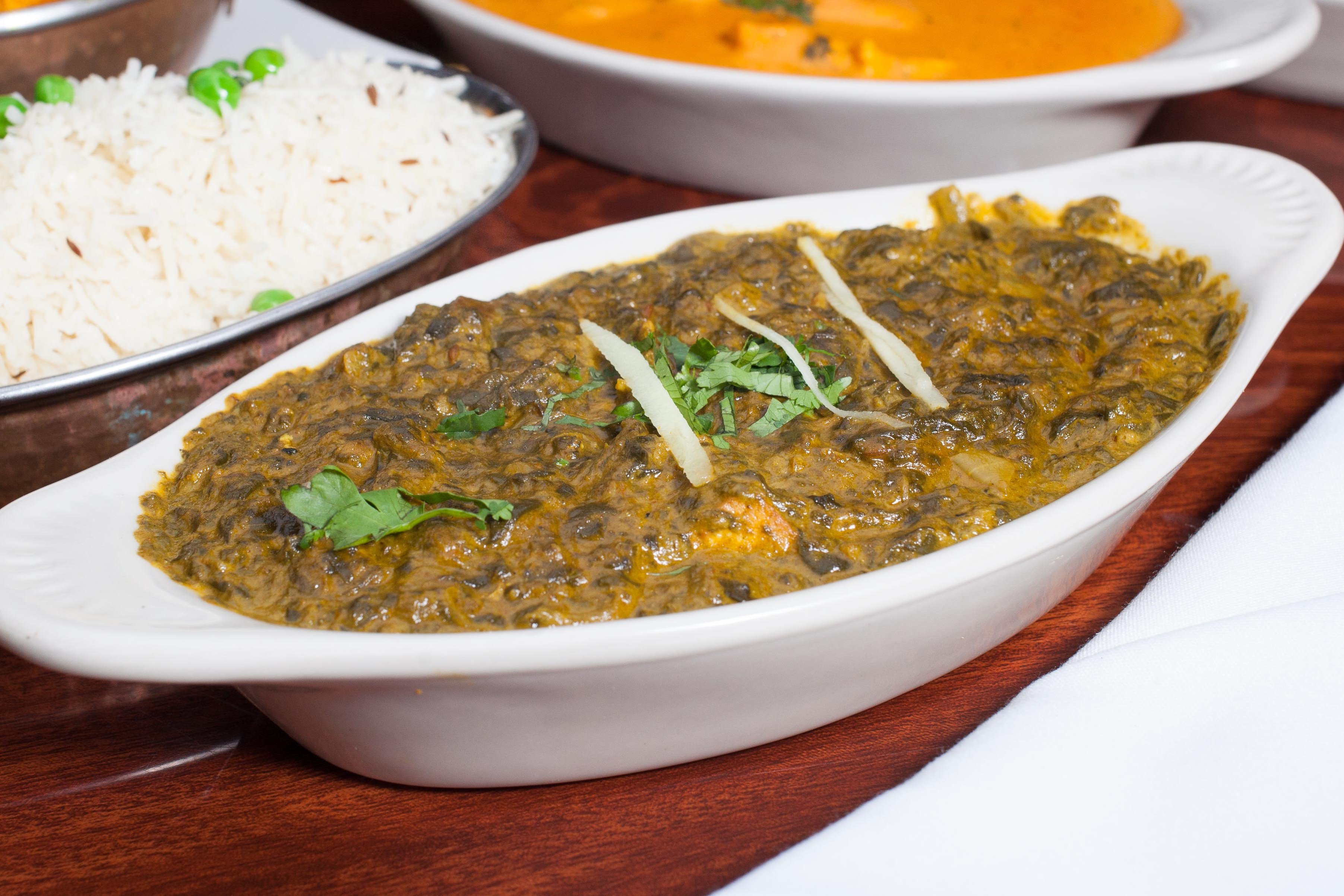 Order Saag Paneer food online from Om Indian Cuisine store, San Francisco on bringmethat.com