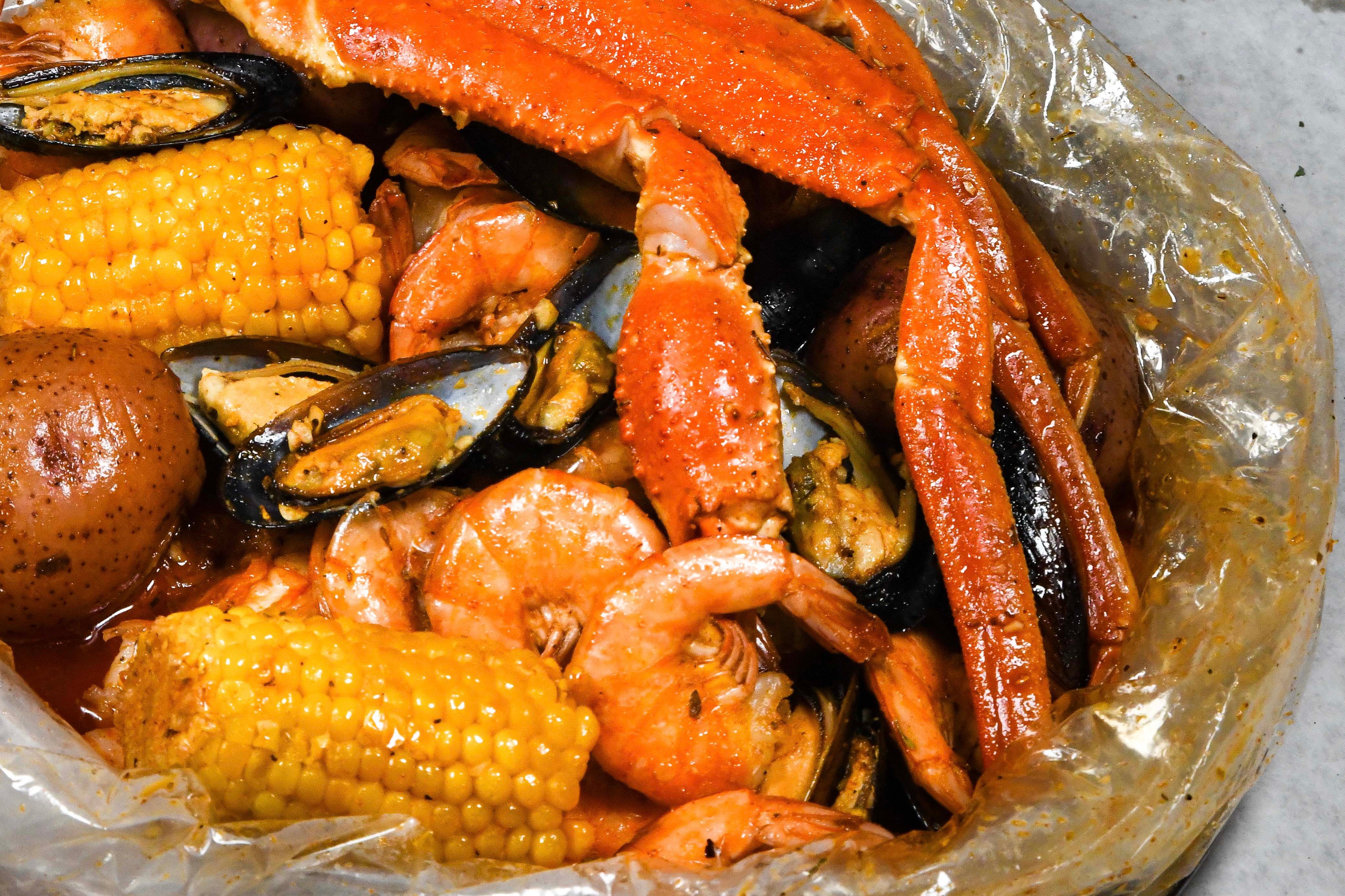 Order O: The Perfect Storm food online from Hook & Reel Cajun Seafood & Bar store, Montgomery Village on bringmethat.com