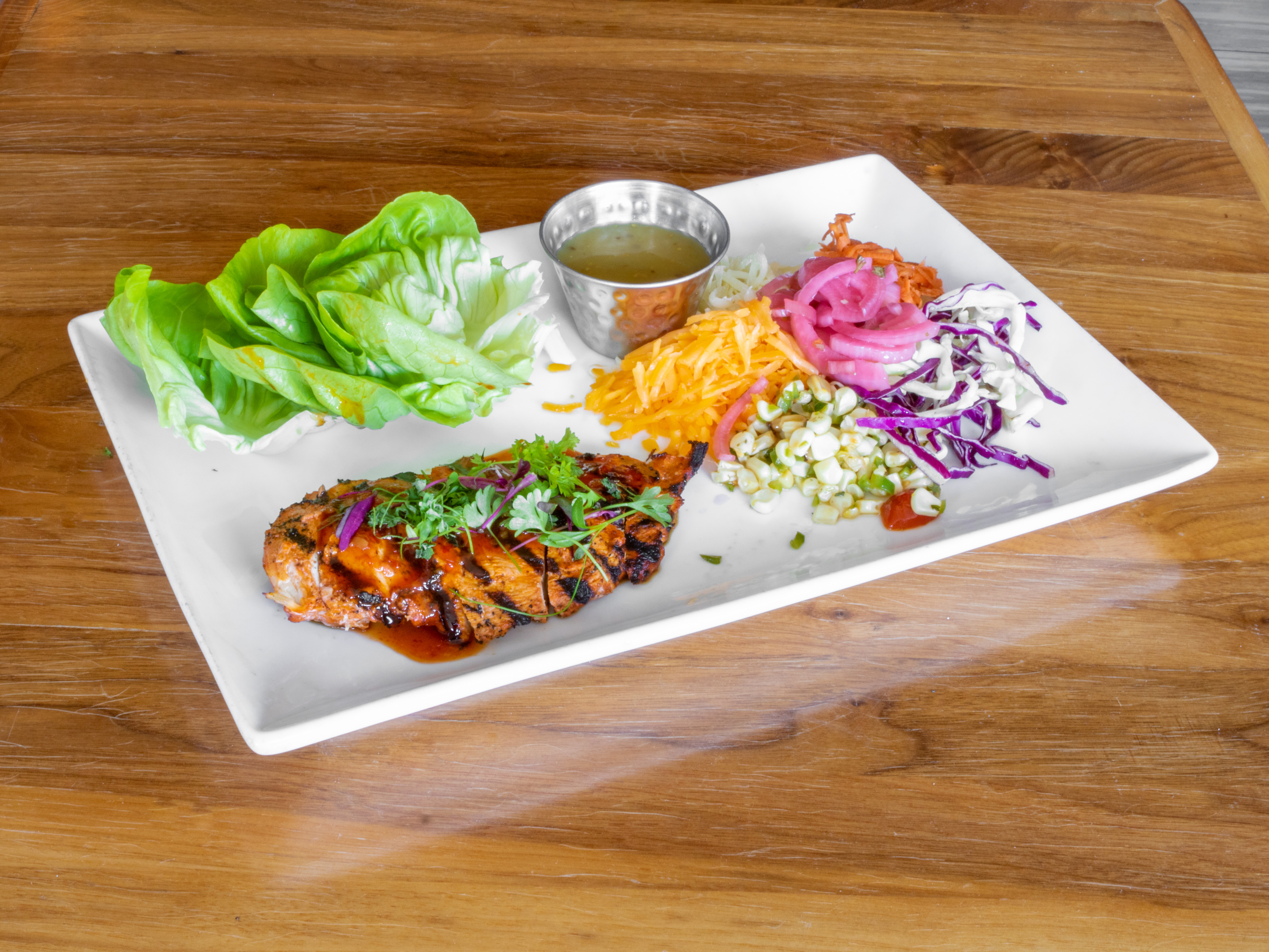 Order Guajillo Tamarind Chicken Lettuce Wraps food online from City Grill store, Covina on bringmethat.com