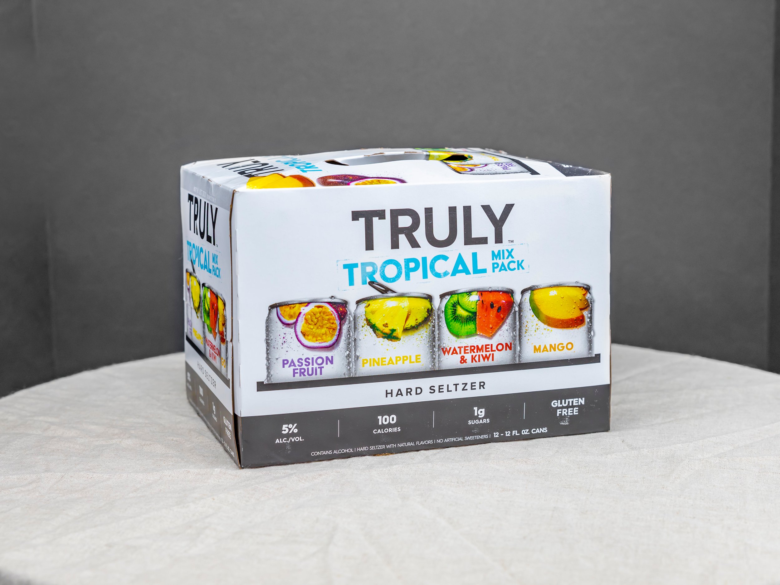 Order 12 Pack Truly Tropical Mix food online from Bistro Liquor store, Huntington Beach on bringmethat.com