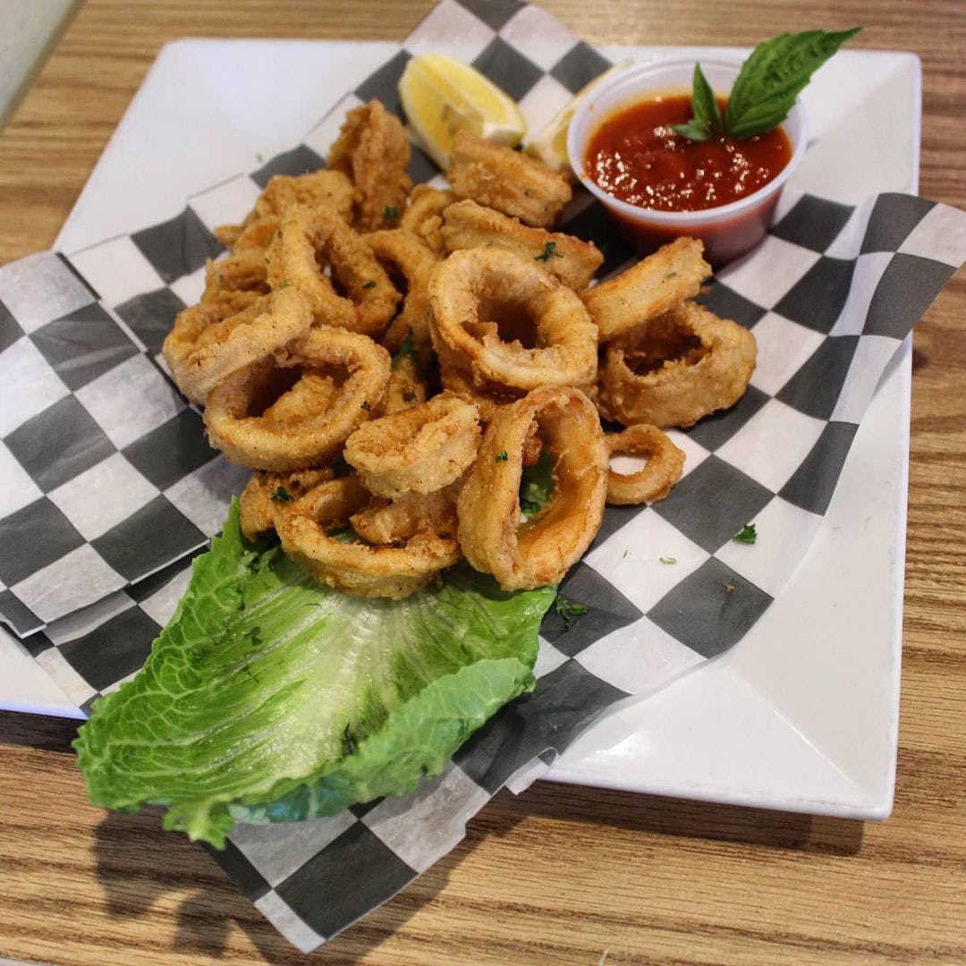 Order Onion Rings - Appetizer food online from Foschini's Brick Oven Kitchen store, Dumont on bringmethat.com