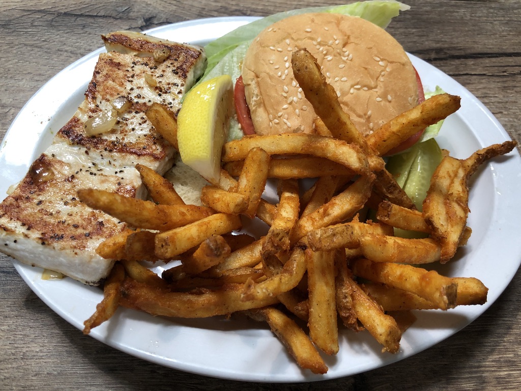 Order Fish Sandwich food online from Coyote Grill store, Laguna Beach on bringmethat.com