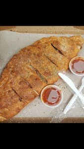 Order Meat Lover's Calzone food online from Palermo Pizza store, Greensboro on bringmethat.com