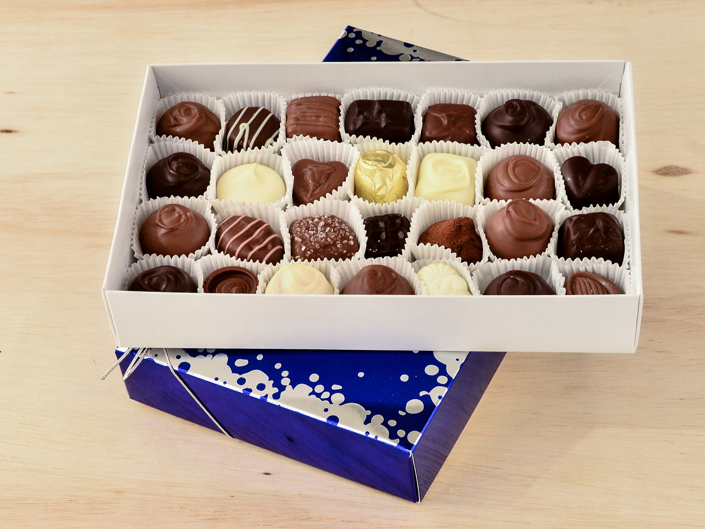 Order Sapphire Premium Box Chocolates food online from Tickled Sweet store, Milford on bringmethat.com