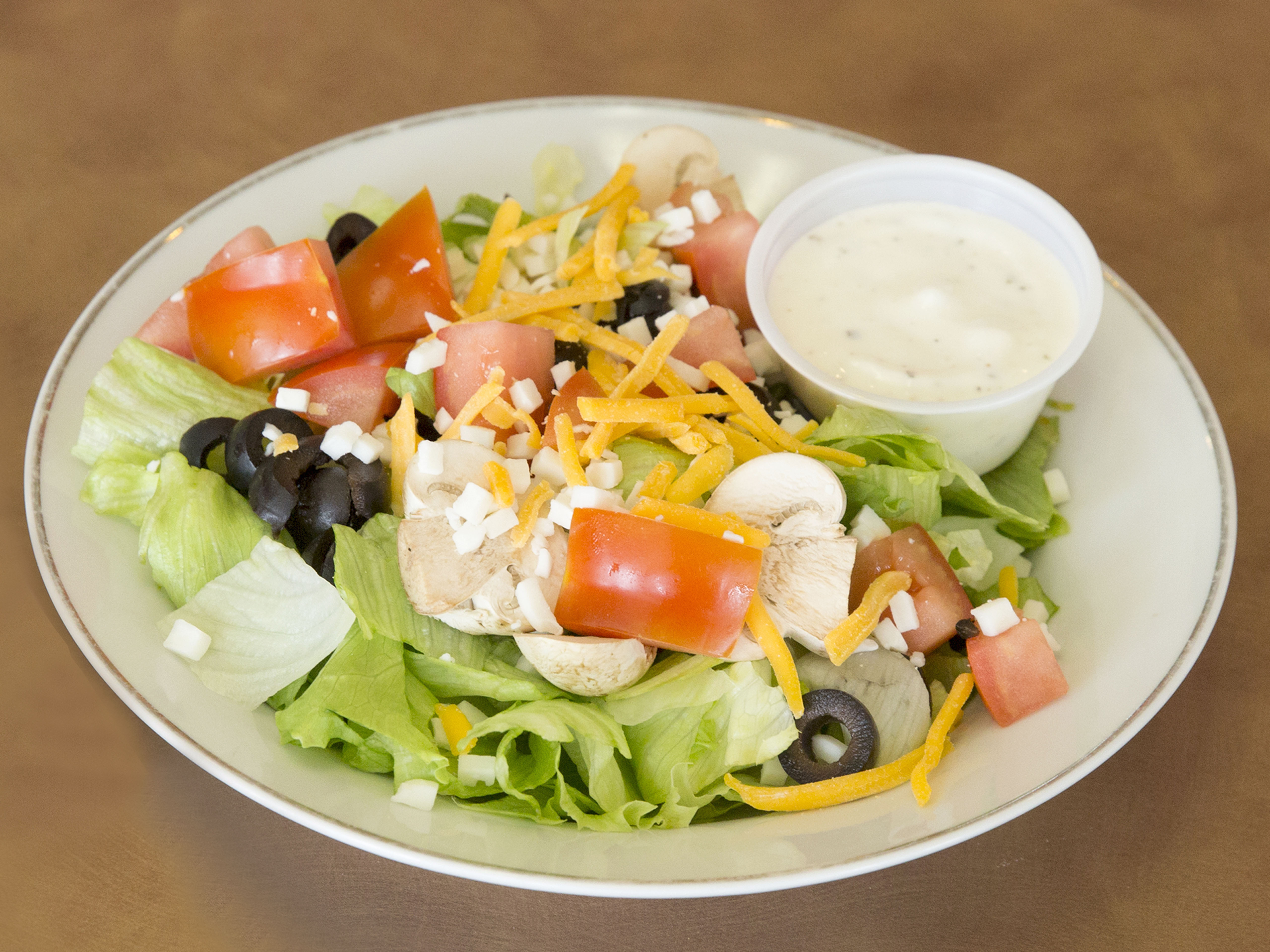 Order Garden Salad food online from Pudge Bros. Pizza store, Seattle on bringmethat.com