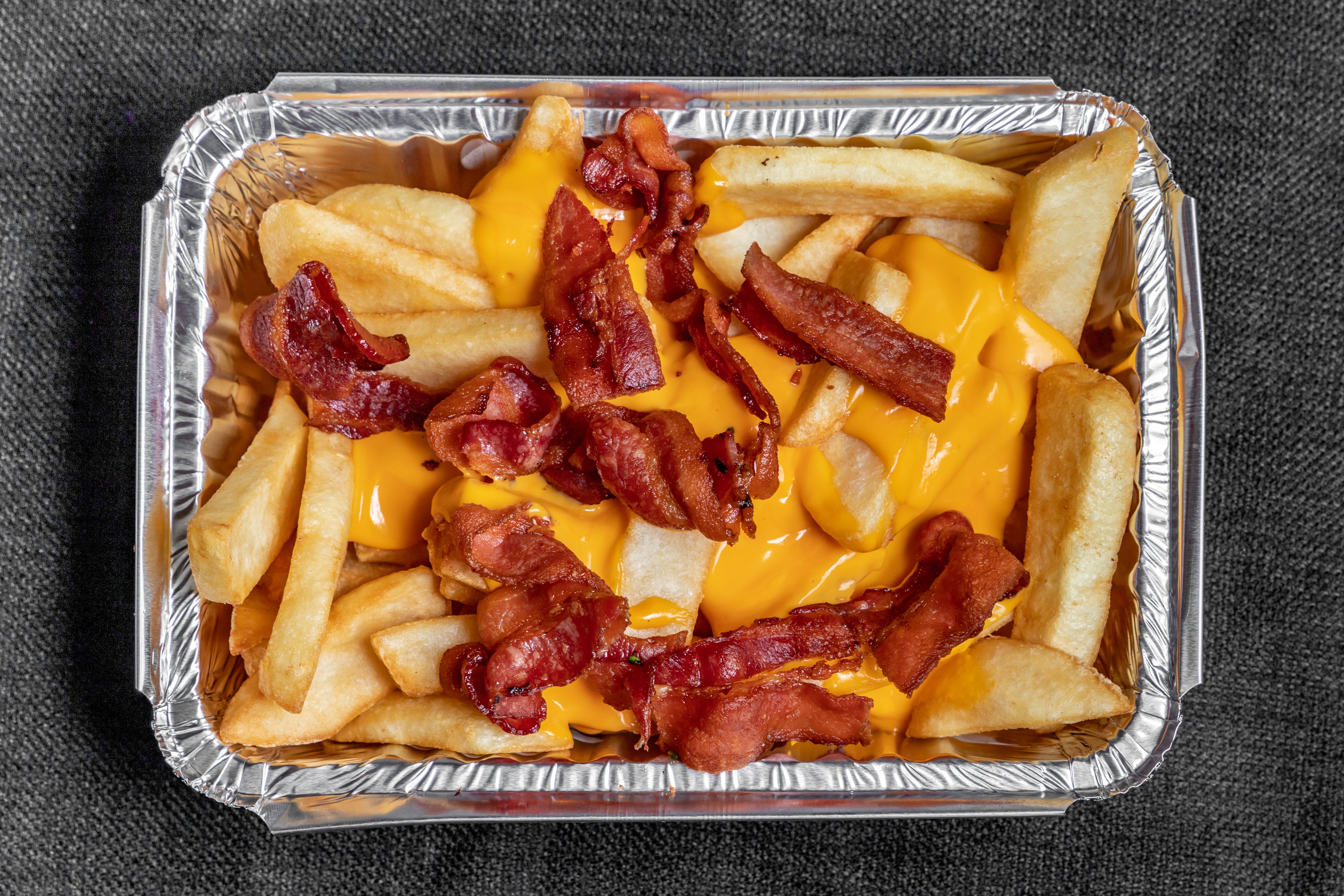 Order Bacon Cheddar Fries - Large food online from Primos restaurant store, Boston on bringmethat.com