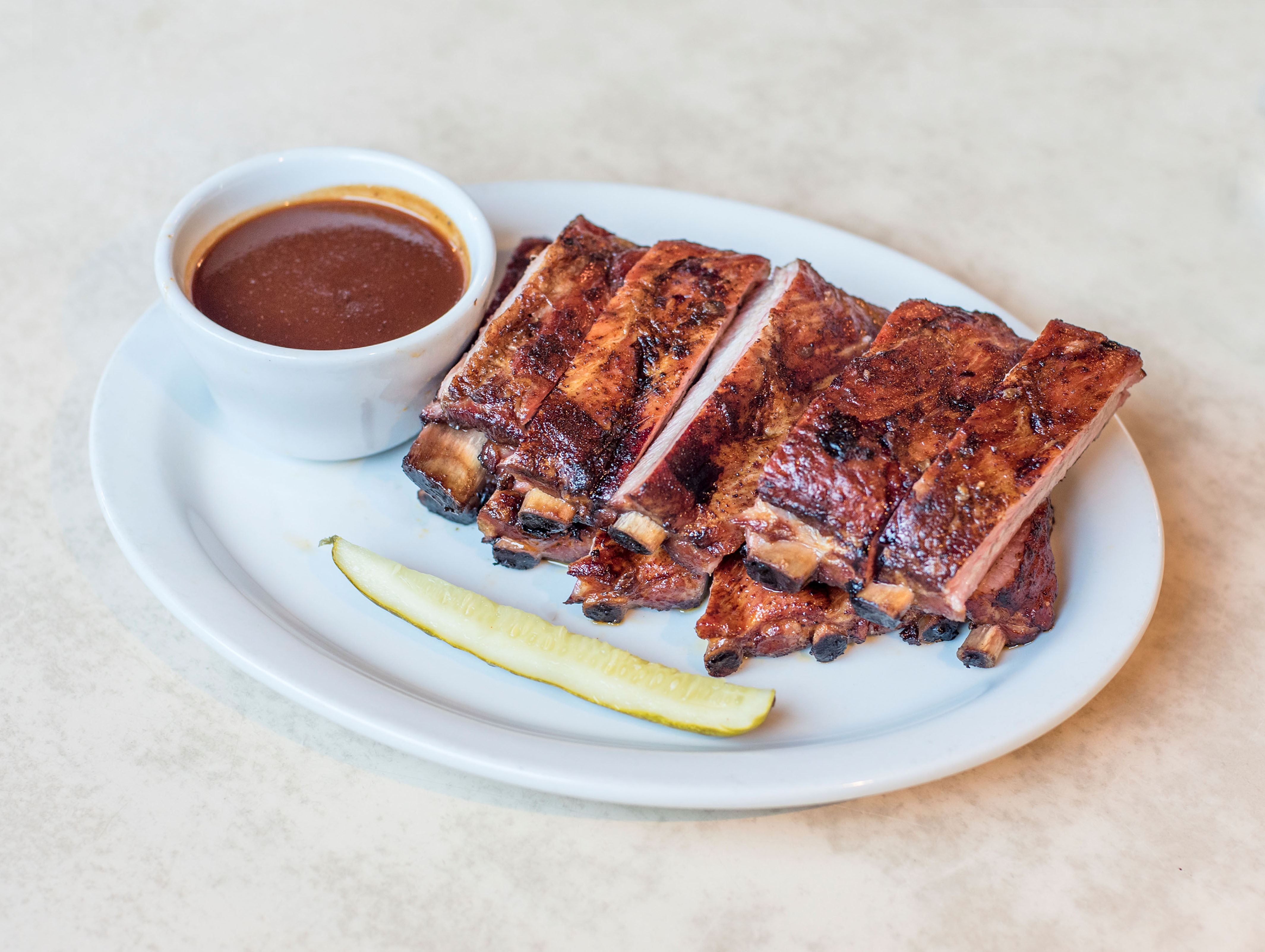 Order Feature Ribs with Side food online from Emil Villas BBQ store, Hayward on bringmethat.com