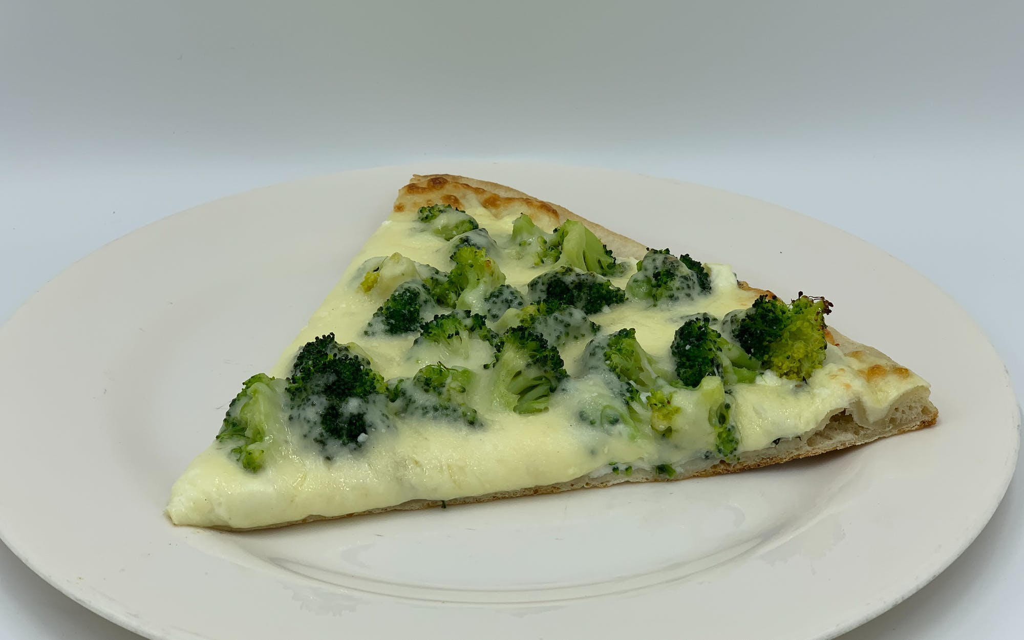 Order White Broccoli Pizza - Personal food online from Mario Pizza store, Westbury on bringmethat.com