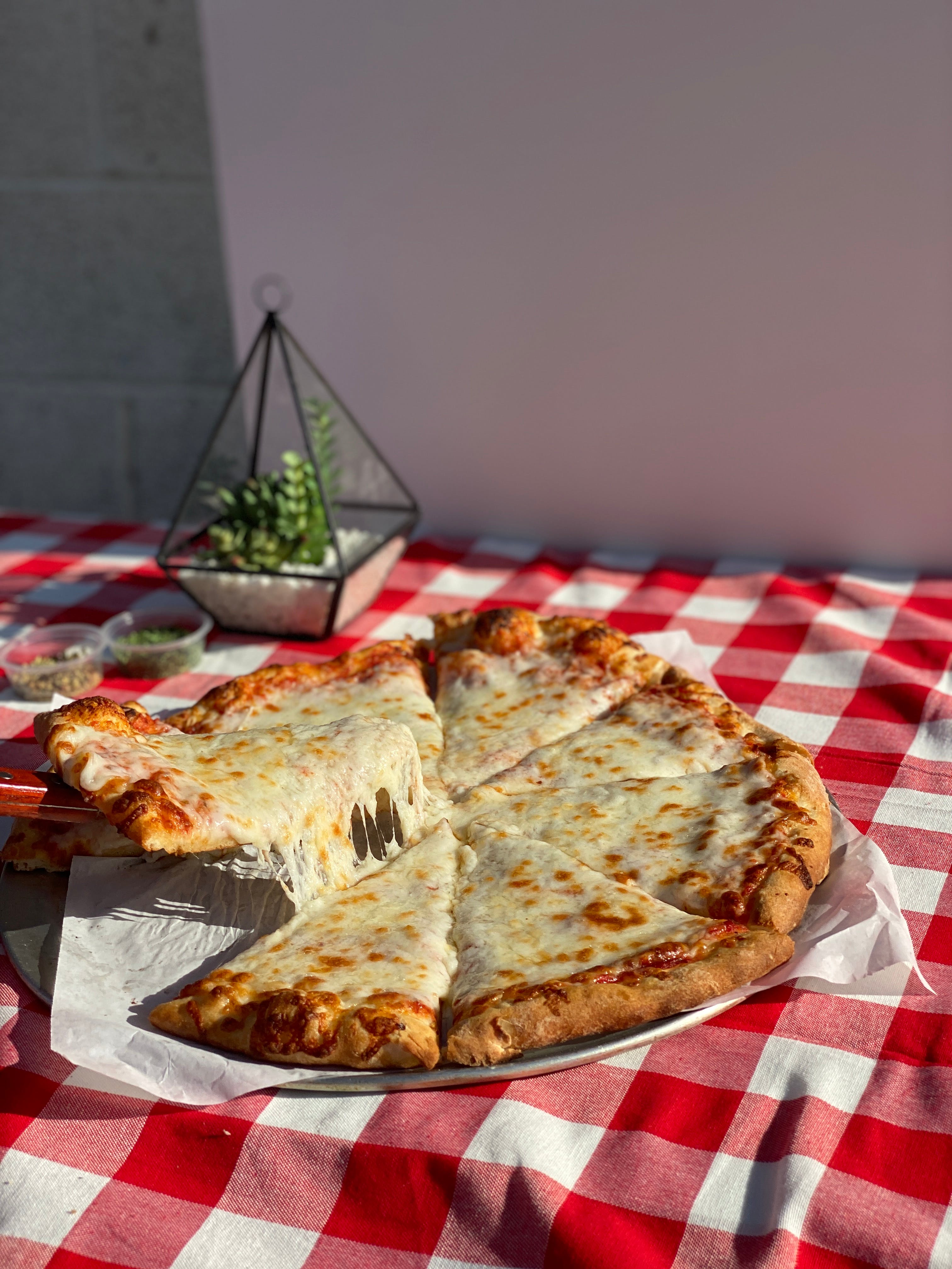 Order New York Style Hand Tossed Cheese Pizza - Small 10'' (1-2 People) food online from Magura Pizza store, Las Vegas on bringmethat.com