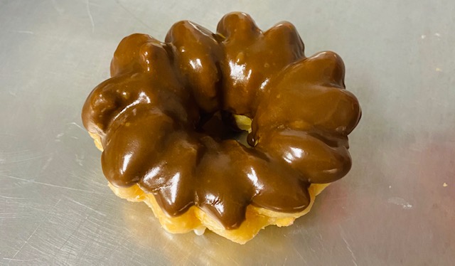 Order Chocolate French Cruller food online from Highland Donuts store, Bakersfield on bringmethat.com