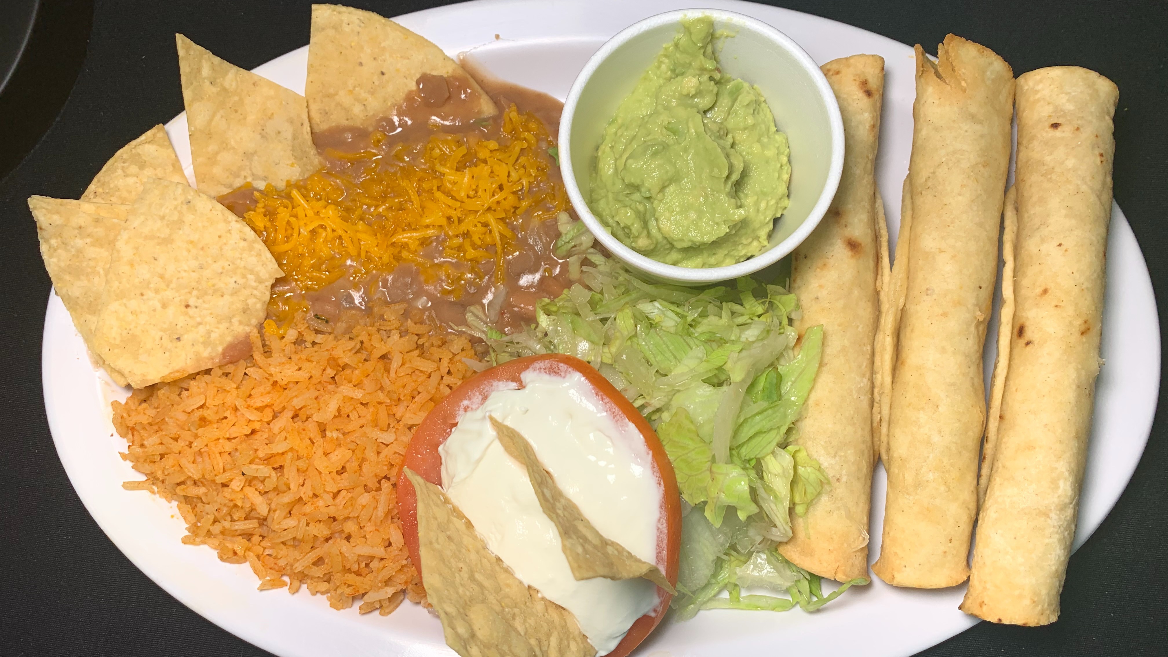 Order 3 Rolled Taquitos Plate food online from Durango Taco Shop #4 store, Las Vegas on bringmethat.com