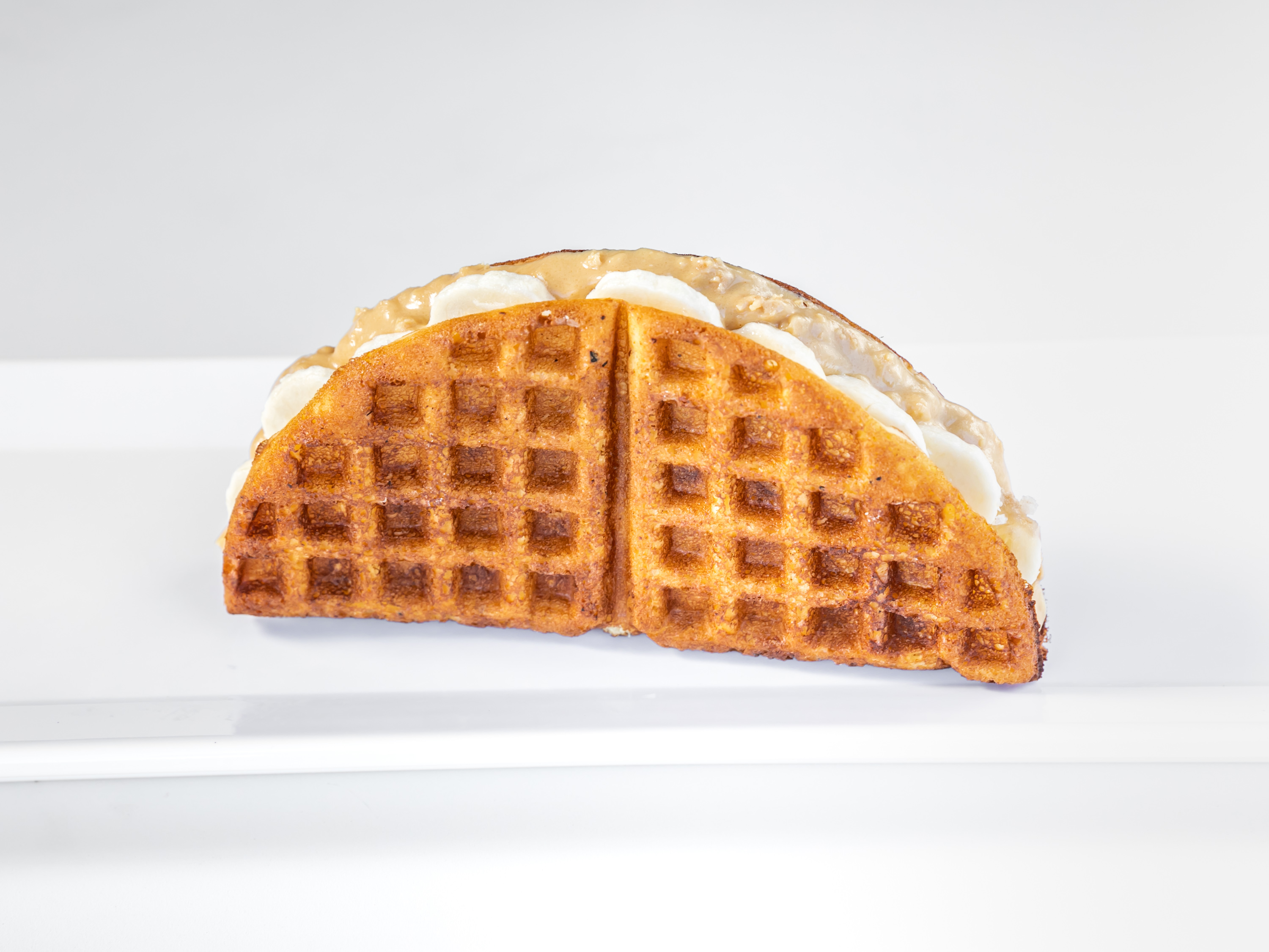 Order Banana and Peanut Butter Waffle Sandwich food online from Famous Waffle Sandwich store, San Diego on bringmethat.com