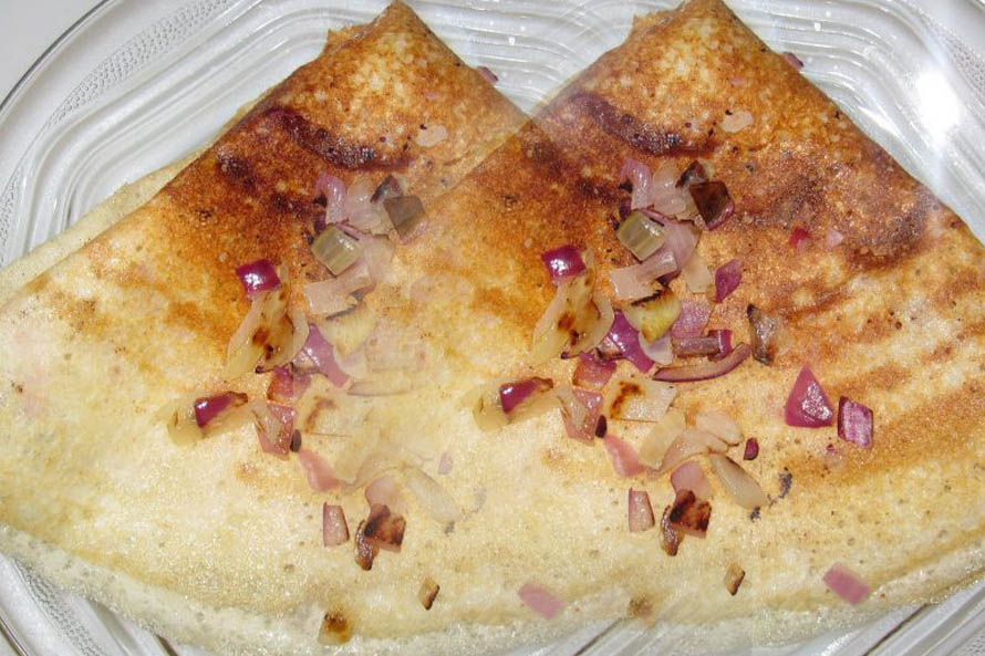 Order Onion MAsala Dosa food online from Priya Indian Cuisine store, Lowell on bringmethat.com