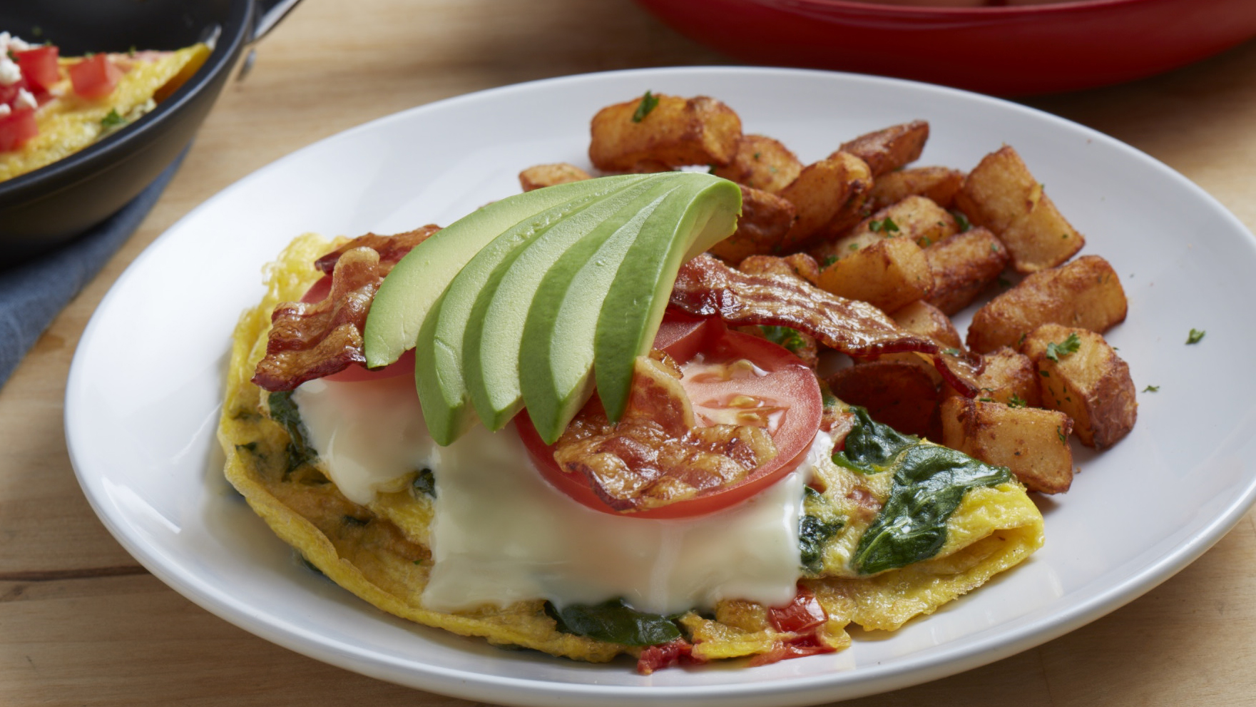 Order Bacon Avocado Omelet food online from Mimi's Cafe store, Irvine on bringmethat.com