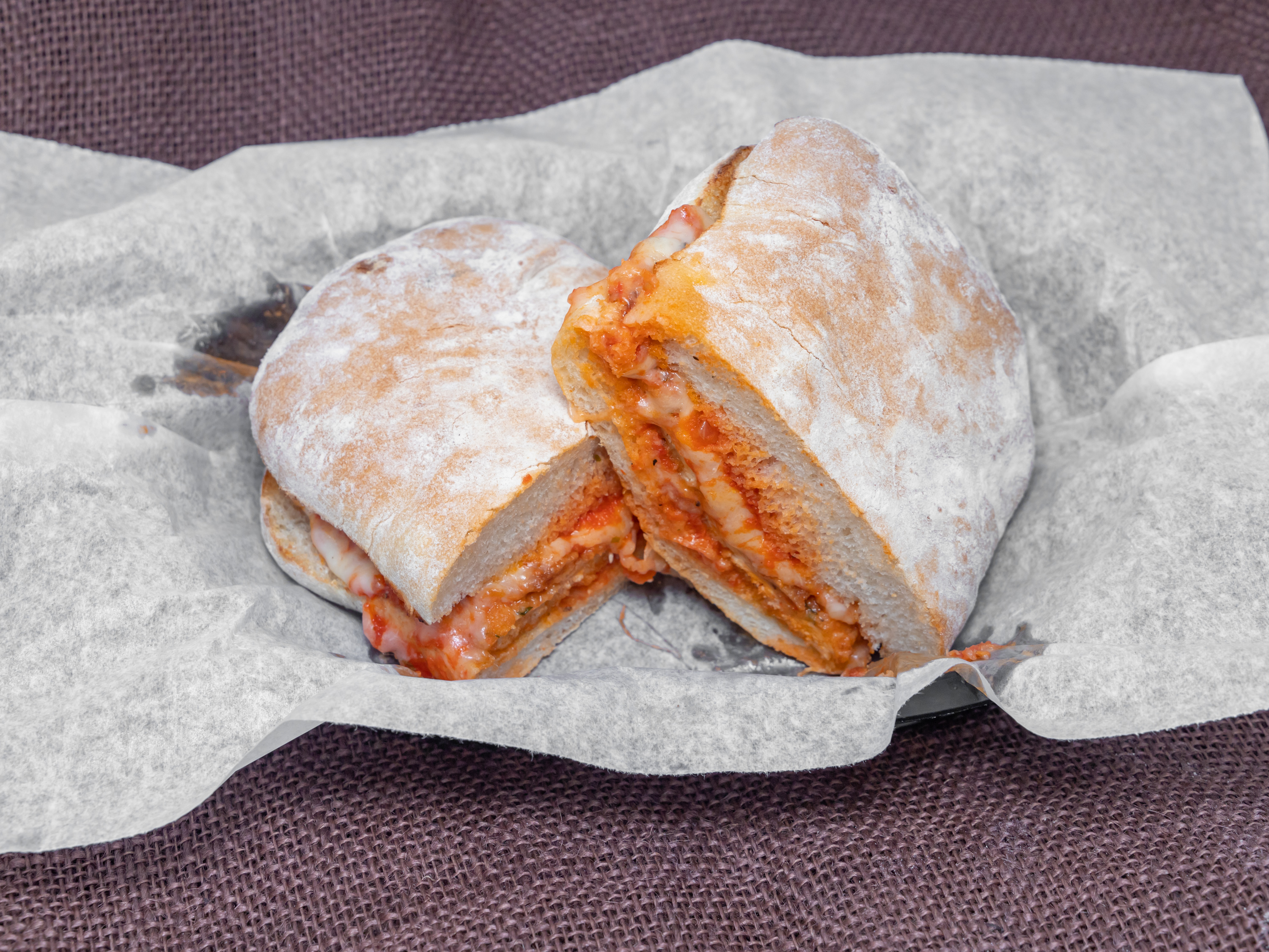 Order Chicken Parmigiana Sandwich food online from Cucina Mia Cafe And Deli store, Quincy on bringmethat.com